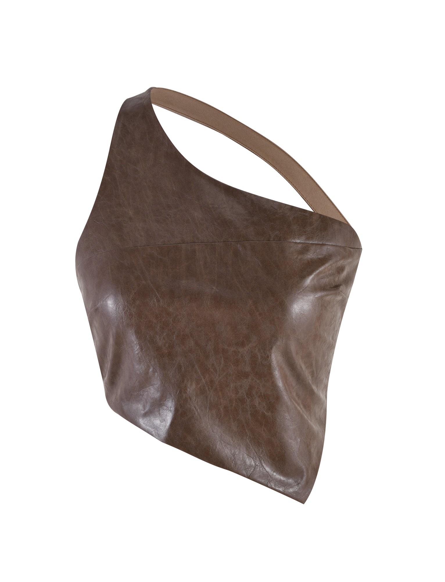 The ZOYA TOP - BROWN from TIGERMIST is an asymmetrical leather crop top featuring a single strap over one shoulder. Its smooth, slightly glossy texture gives it a modern, edgy look.