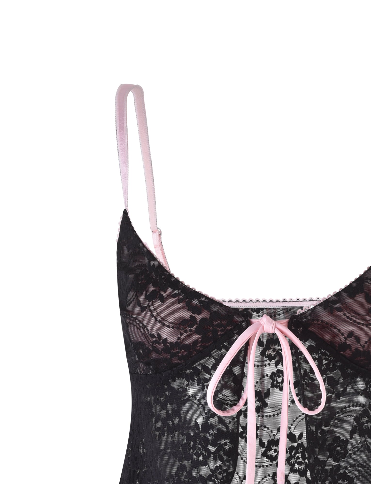 A close-up of the TIGERMIST MELANIE TOP - BLACK lace lingerie piece showcases its sheer material and intricate floral patterns, complemented by delicate pink satin straps and a charming pink ribbon bow at the center.