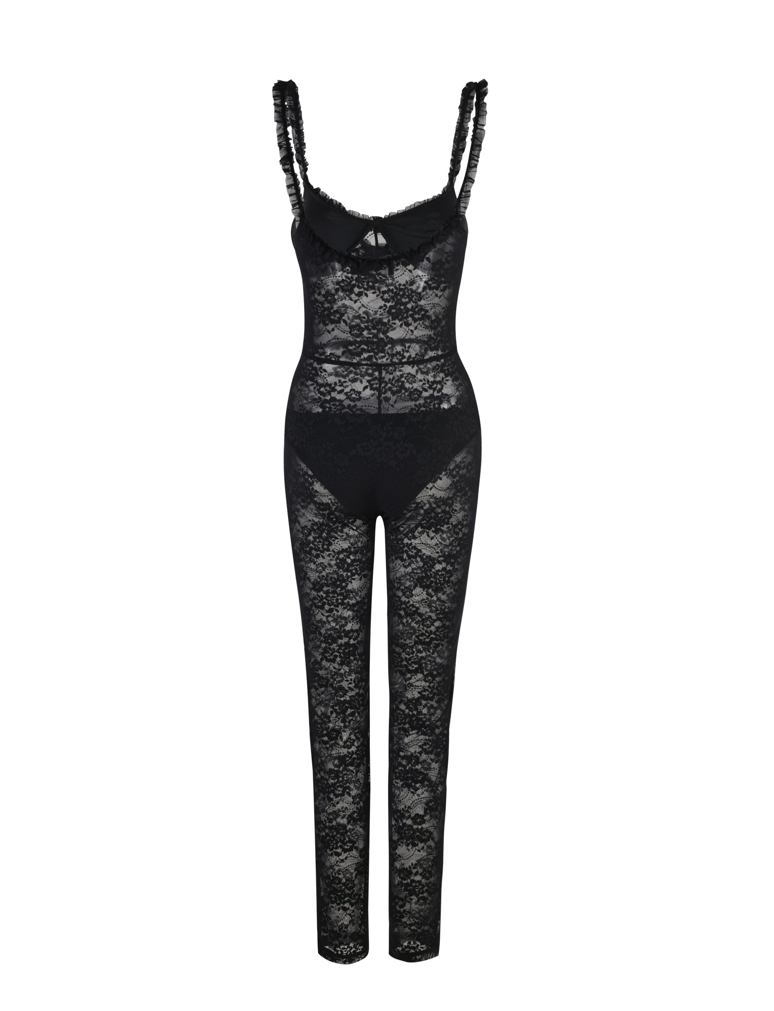 The DEJA JUMPSUIT - BLACK : LACE from TIGERMIST is a black, sleeveless lace bodysuit with long legs. This garment showcases a semi-sheer floral lace pattern, adorned with ruffled trim along the straps and a small bow detail at the center of the bust. Its form-fitting design exudes an elegant and sensual style.