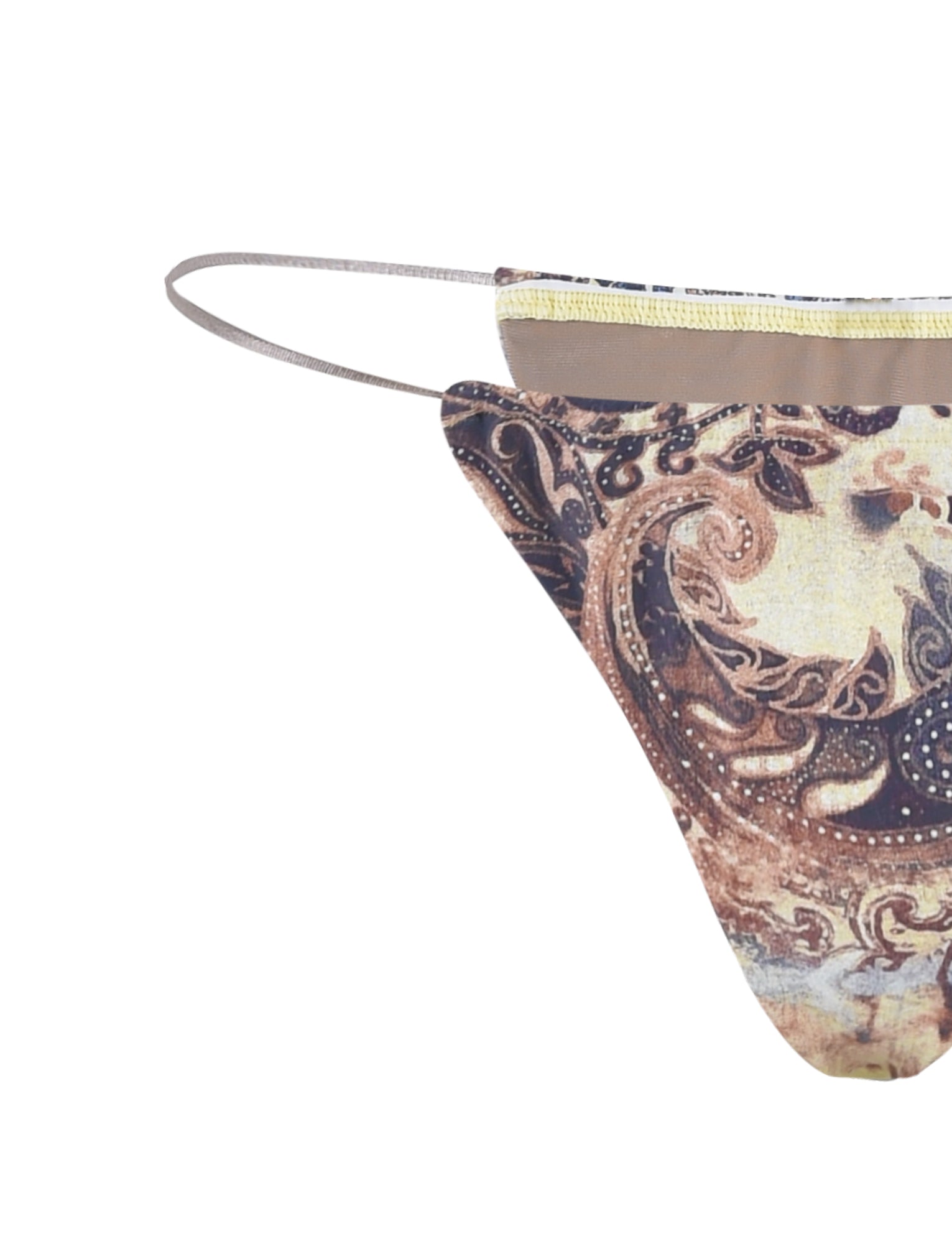 A detailed image of the TIGERMIST KRYZE Bikini Bottom - Multi : Tie Dye : Paisley Tie Dye. The fabric showcases intricate paisley designs in shades of brown, beige, and blue on a cream-colored background. Partially folded to reveal its contoured shape, this unique bikini bottom stands out with its vibrant patterns.