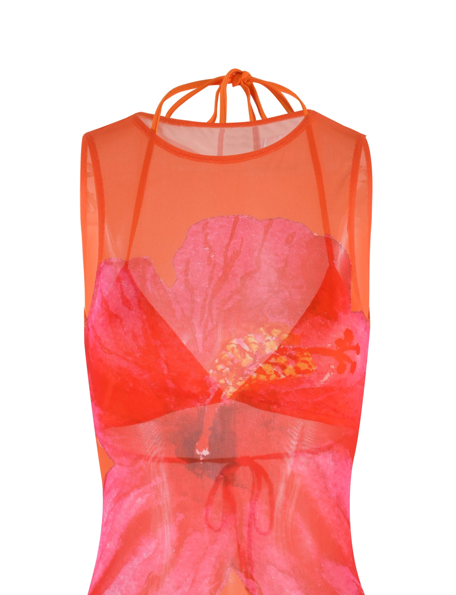 The JOZIE THREE PIECE DRESS - ORANGE : MACRO FLORAL : ORANGE HIBISCUS from TIGERMIST is a sleeveless, sheer orange top with a halter neck tie, featuring a vibrant pink and red floral design on the front. The fabric appears light and flowy, and the floral print adds a bold and colorful focal point to the garment.
