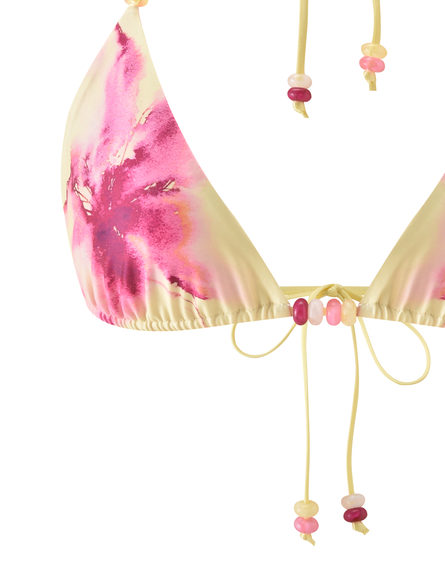 Close-up of the TIGERMIST FINLEA BIKINI TOP - WATERCOLOUR FLORAL, a triangle bikini top with a pink and yellow tie-dye look, adjustable halter neck, thin yellow straps, and beads in pink, yellow, and peach tones.