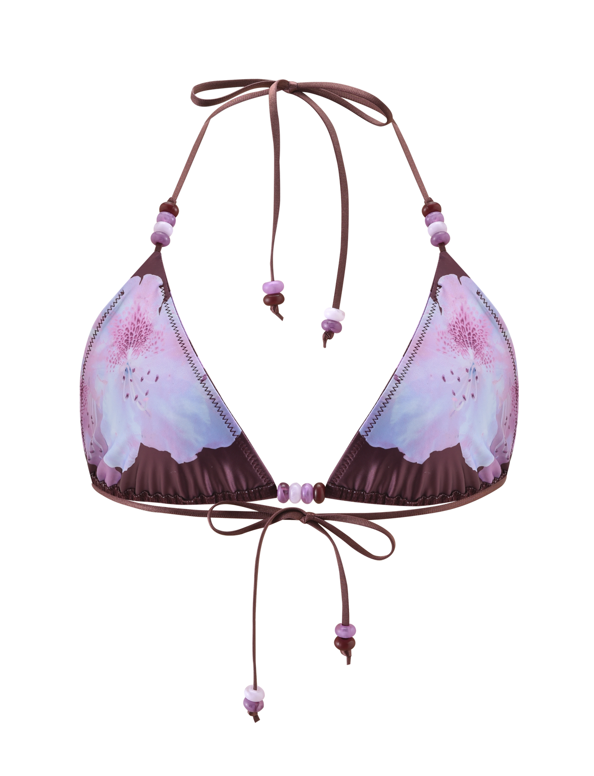 The FINLEA BIKINI TOP - ZEN FLORAL by TIGERMIST features a purple floral print with pink and light purple flowers, a halter neck, and beaded strap accents. Displayed on a plain white background.