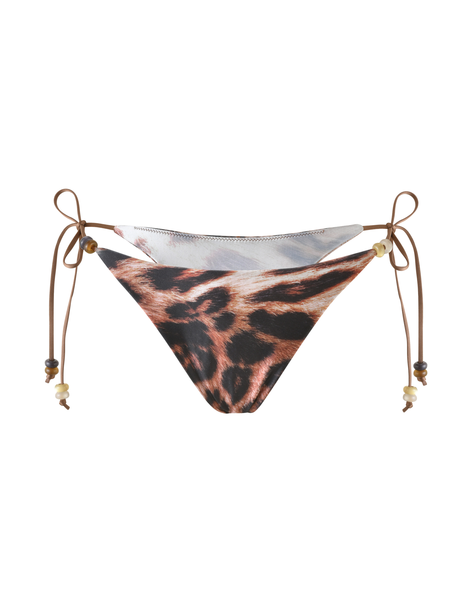 The FINLEA BIKINI BOTTOM by TIGERMIST in Leopard Haze features a cheeky cut, brown side ties with bead and shell accents, displayed on a plain white background.