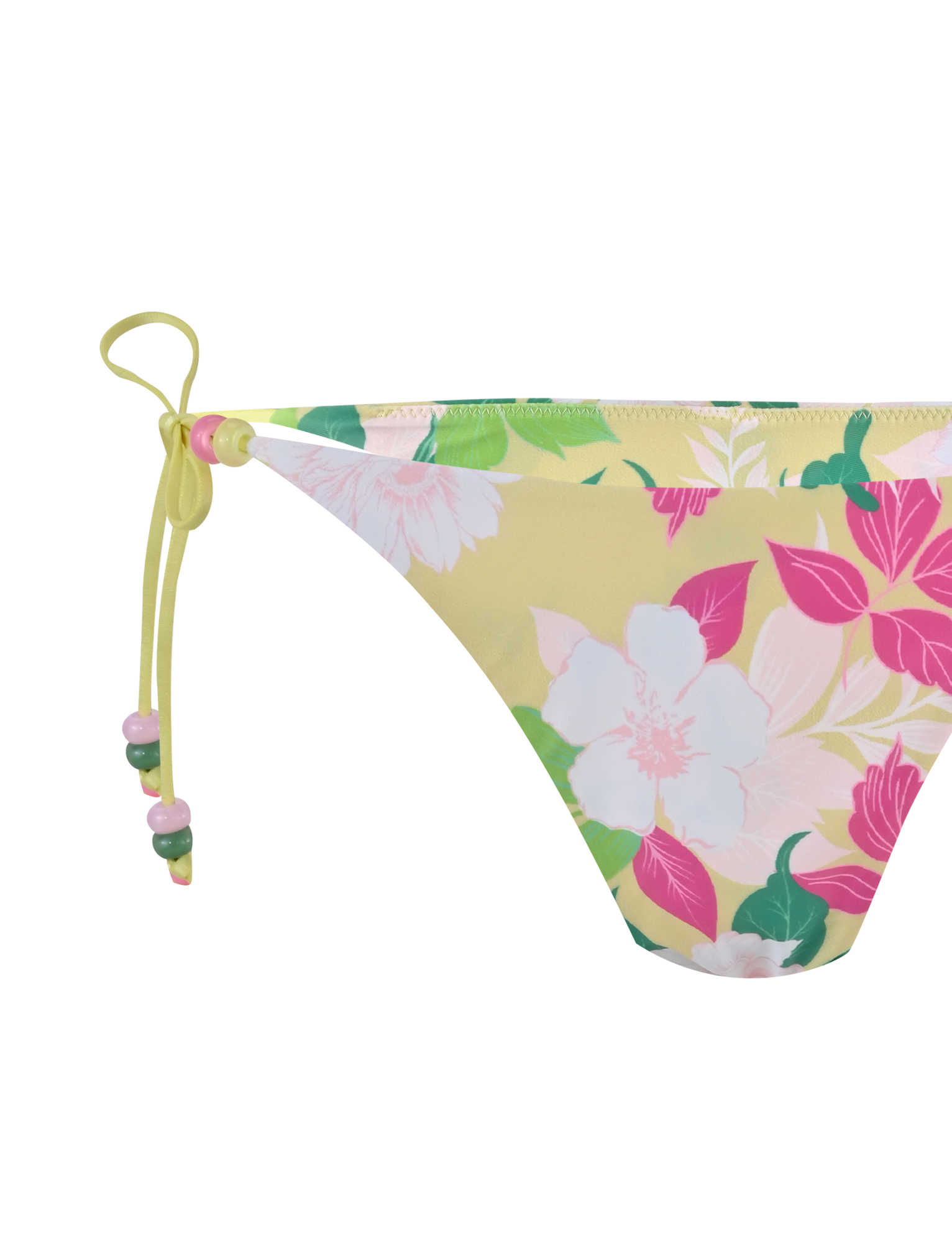 A close-up of the TIGERMIST FINLEA BIKINI BOTTOM - PAISLEY BORDER featuring a yellow floral print, cheeky cut, side tie with bow, and beaded accents.