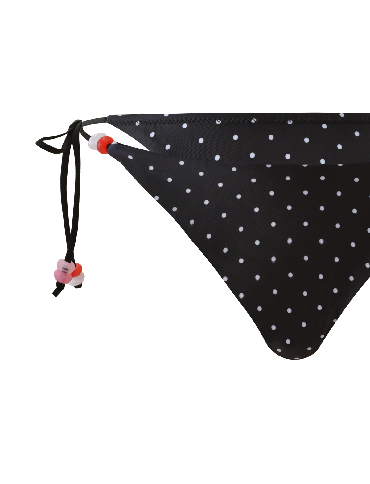 The FINLEA BIKINI BOTTOM - POLKA DOT BLACK CREAM by TIGERMIST features a cheeky fit, side ties with pink, red, and white beads, and is crafted from smooth fabric that stands out against a plain white background.