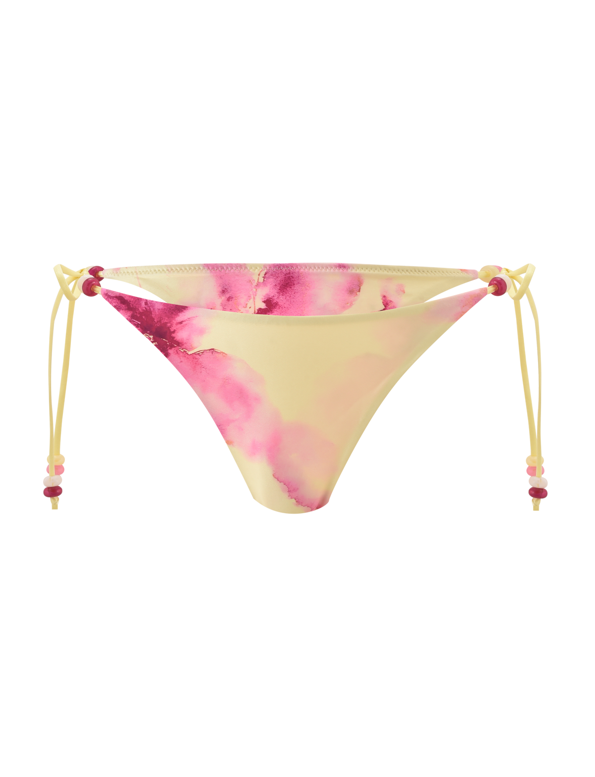 The FINLEA BIKINI BOTTOM - WATERCOLOUR FLORAL by TIGERMIST features a yellow cheeky cut with a pink tie-dye floral pattern, adjustable side ties, and playful pink and red beaded details, shown on a plain white background.