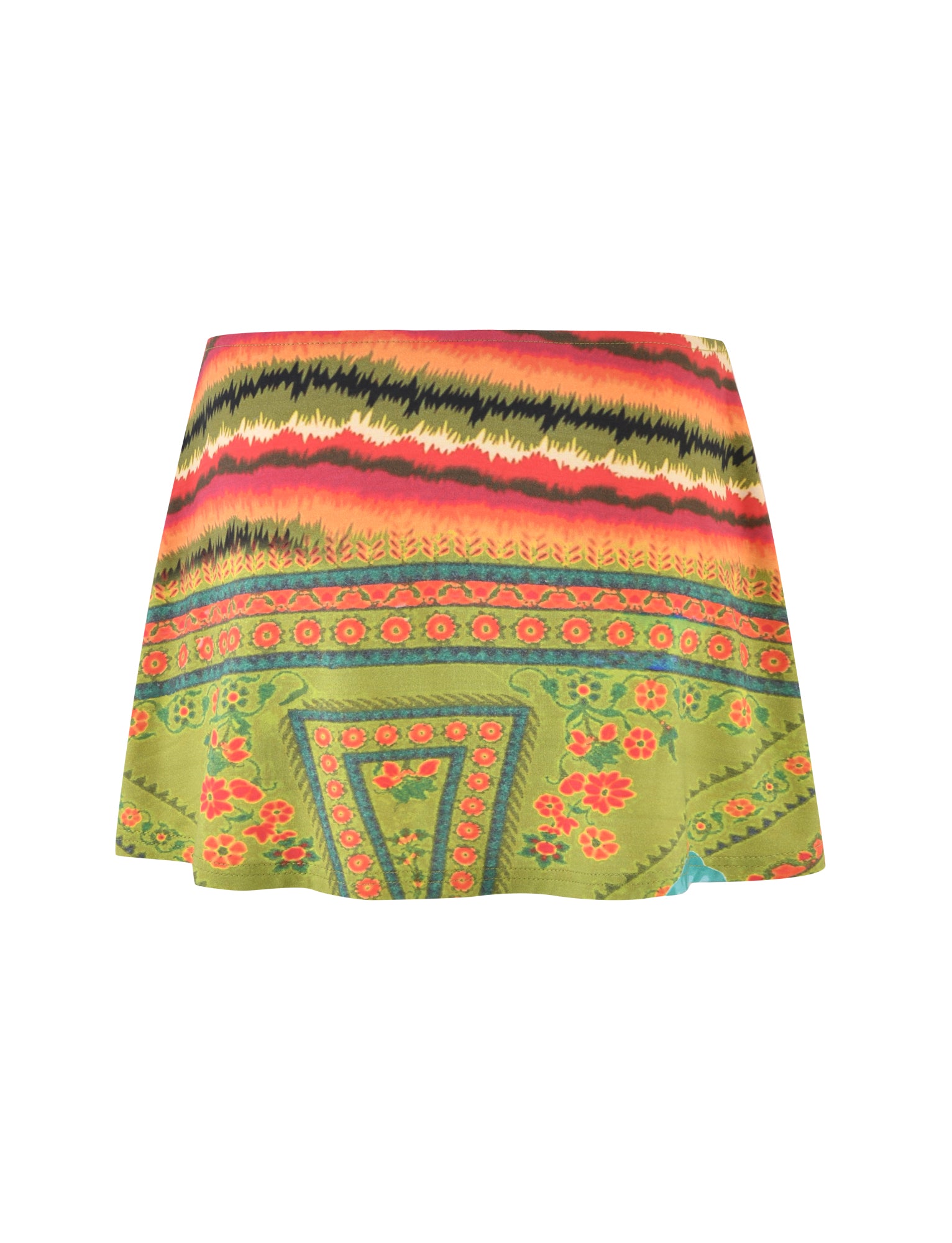 Introducing the QUINLEY SKORT by TIGERMIST, a vibrant mini skirt showcasing a colorful and intricate pattern. The design features horizontal stripes in red, yellow, black, and orange, alongside green sections adorned with floral and geometric motifs in red, orange, and blue tones.
