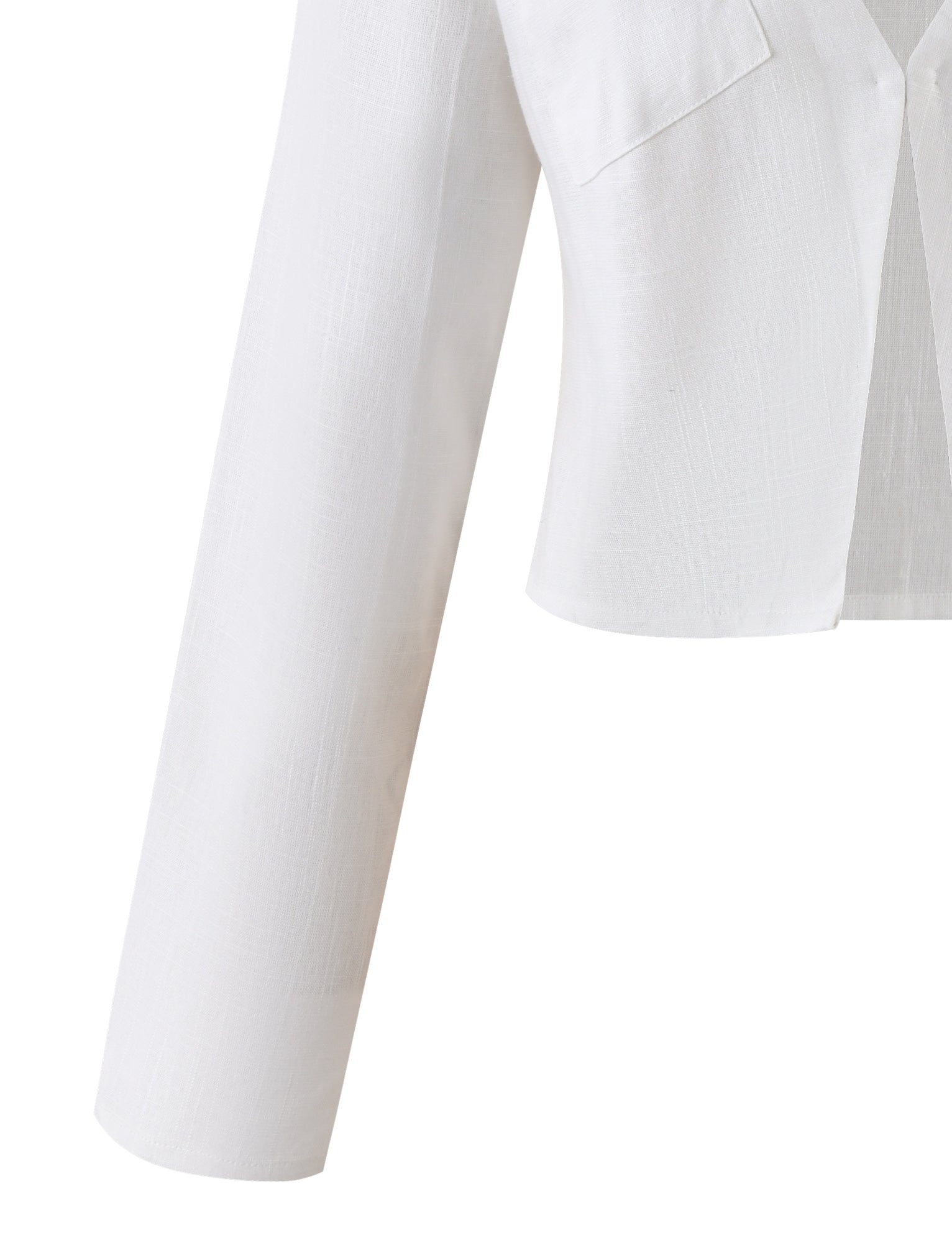 A close-up of the AIDEN TOP - WHITE from TIGERMIST. The top features a slightly textured fabric, a cropped length, and boasts a simple, collarless design. Only a portion of the top is visible, focusing on the sleeve and chest area.