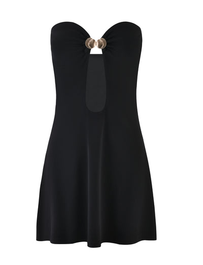 The CECILY MINI DRESS - BLACK by TIGERMIST is a strapless dress with a sweetheart neckline. It features a keyhole cutout at the chest, gathered with a gold metallic ring detail. The dress is fitted at the top and flows loosely towards the hem.