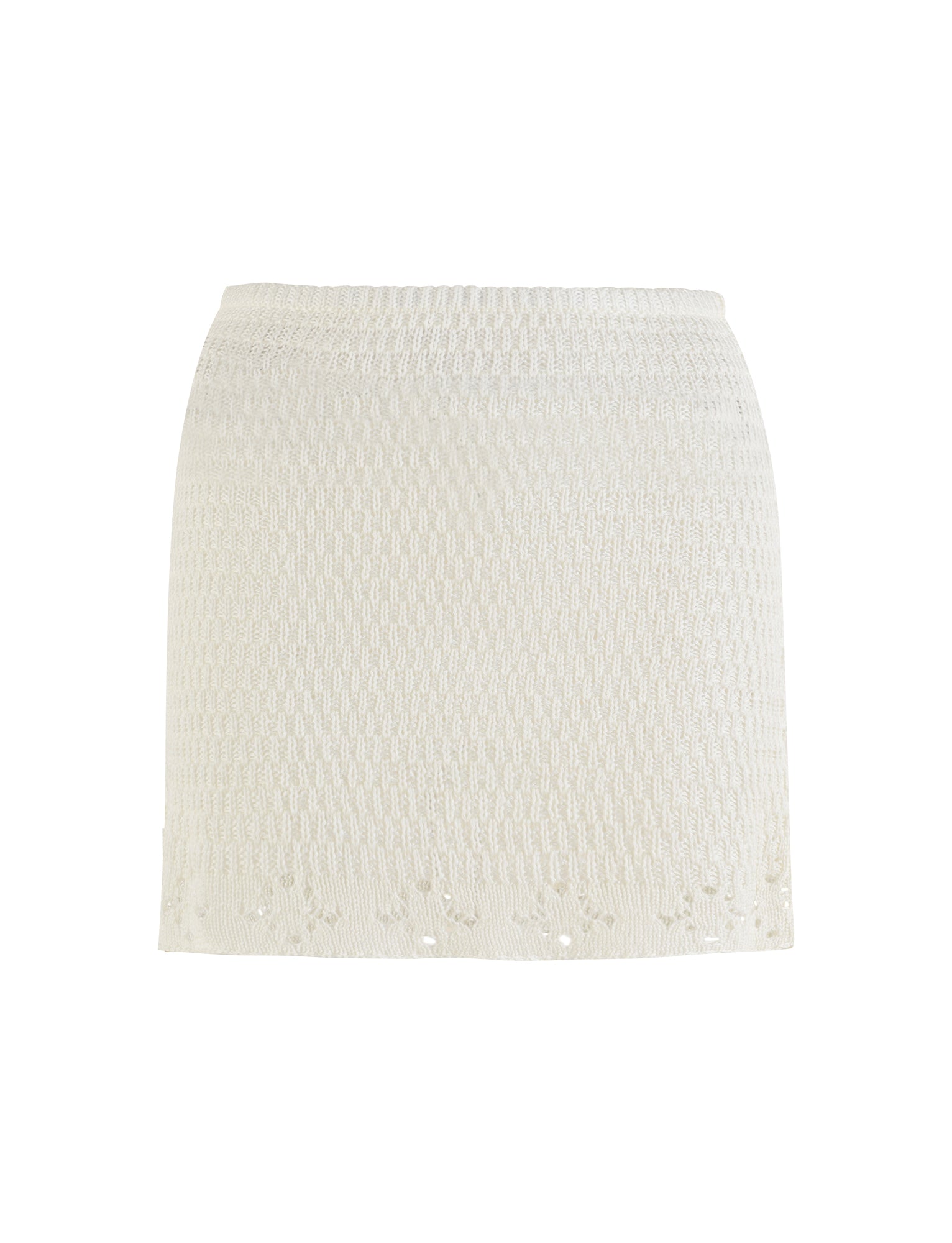 Against a plain background, the JANAI SKIRT - WHITE : CREAM from TIGERMIST is showcased. This textured, low-rise mini skirt highlights a subtle woven pattern throughout and features a slightly scalloped hem with delicate cut-out details, emphasizing its semi-sheer crochet fabrication.