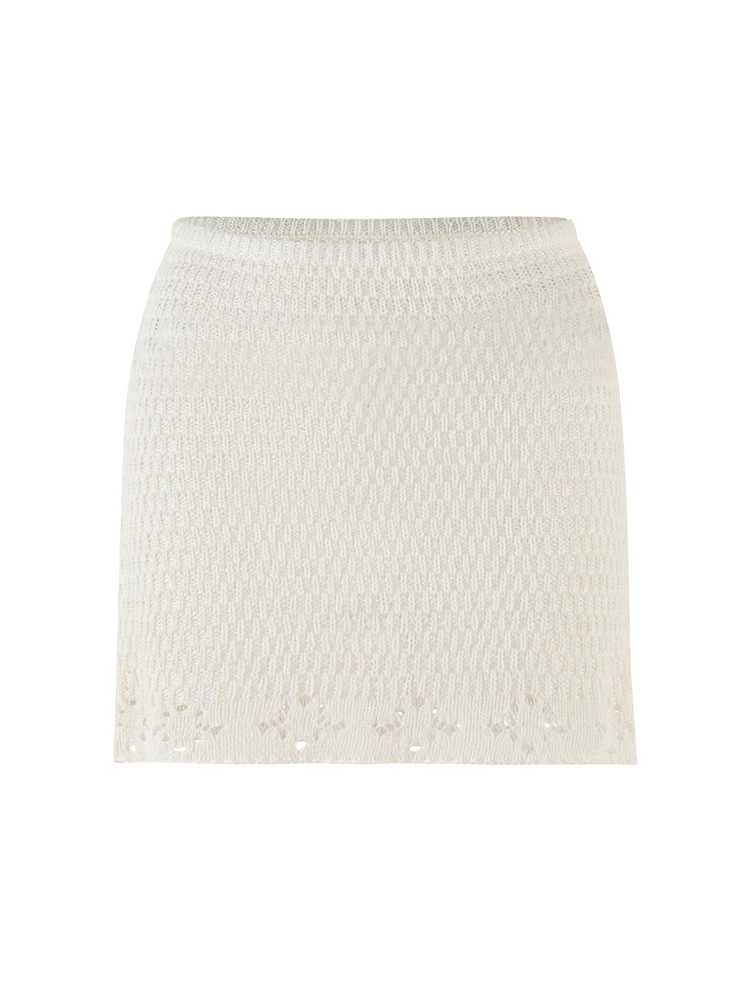 The JANAI SKIRT - WHITE : CREAM by TIGERMIST is displayed against a plain background. This mini length skirt features a subtle textured pattern and a slightly flared hem with delicate crochet detailing. It has a fitted waistband for a snug fit.