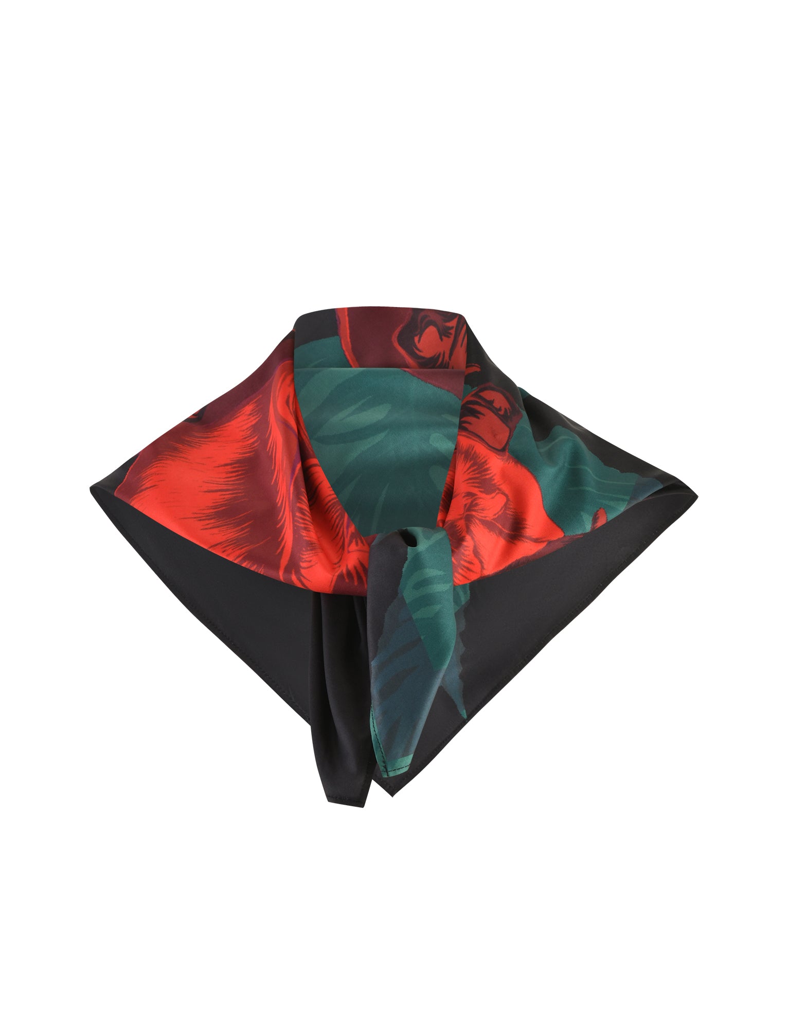 The JOZIE SCARF from TIGERMIST, featuring a bold design with red roses on a black background, is folded into a triangle. The elegant and vibrant combination of colors is perfectly displayed on a plain white backdrop.