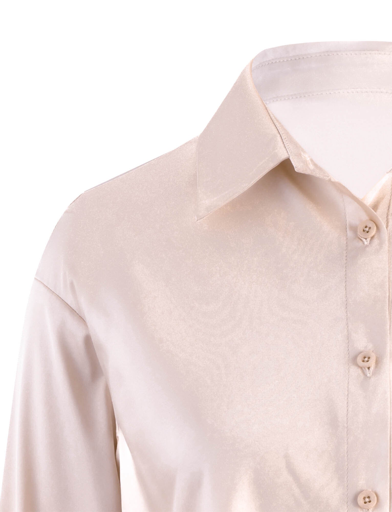 Close-up of a light beige, TIGERMIST ALINA SHIRT - WHITE : IVORY, featuring a satin-like finish with a pointed collar. The shirt's material appears smooth and shiny, reflecting light. The image focuses on the upper torso, collar, and the topmost buttons.