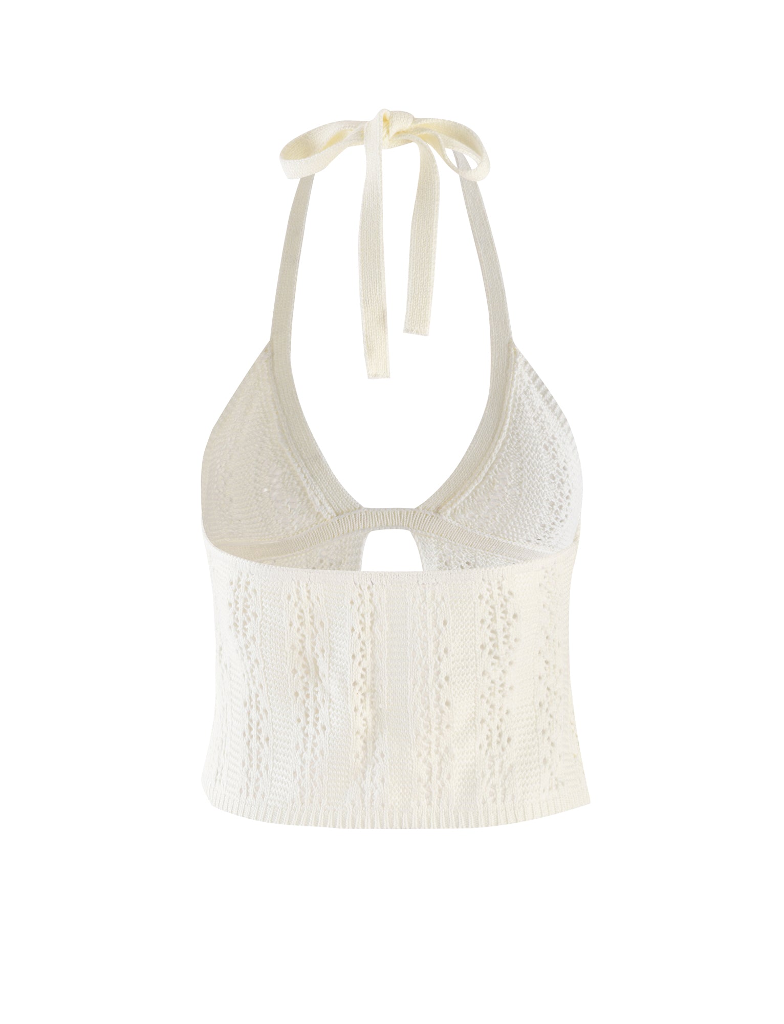 The SANDOR TOP - WHITE from TIGERMIST is a captivating halter crop top that features an intricate knitted pattern. This stylish piece includes a keyhole cutout beneath the bust and ties elegantly behind the neck, making it a unique addition to any wardrobe.