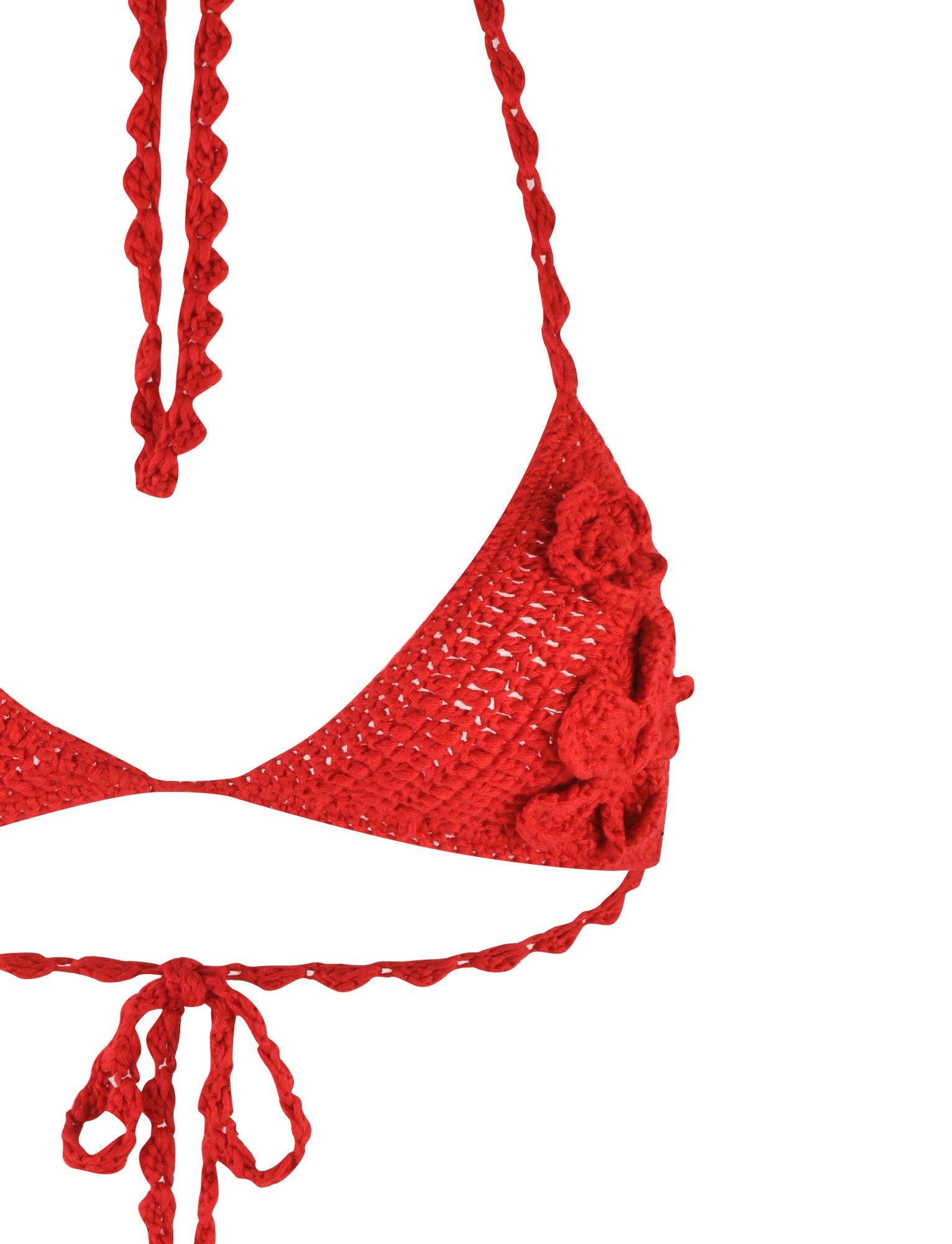 A close-up image of the TIGERMIST Meliora Bikini Top in Berry Red, a red crochet fixed triangle bikini top. It features braided neck and back ties and is adorned with a textured flower pattern on one of the cups. The background is plain white.