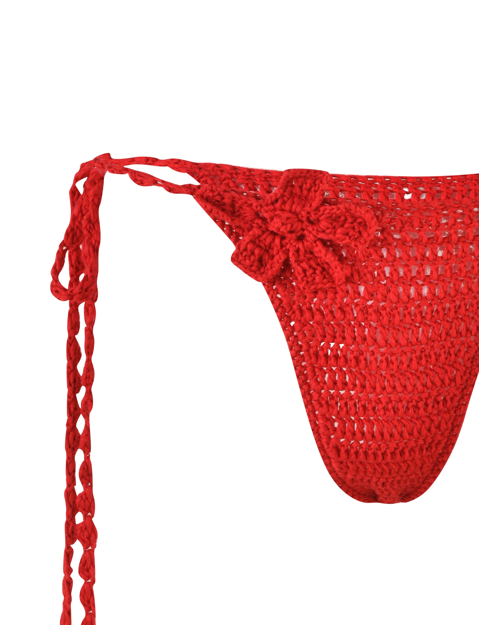 Close-up of TIGERMIST's MELIORA BIKINI BOTTOM in Berry Red, featuring a chic floral design on one side and long braided tie strings on the left. The textured knit pattern adds elegance, while the strings contrast beautifully against the white background.