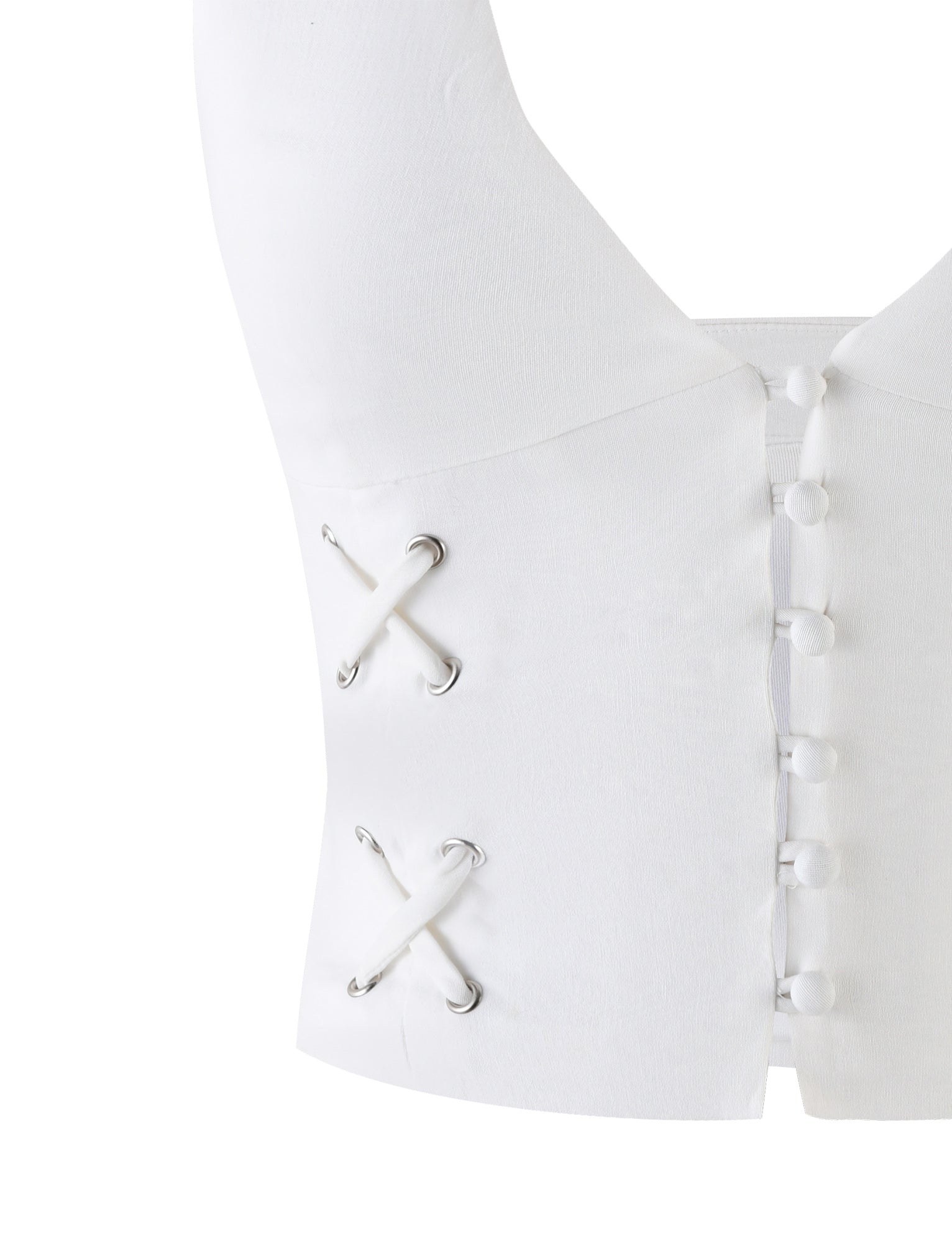 Close-up of the HALSEY TOP - WHITE : CREAM by TIGERMIST, showcasing corset-style lacing on the side with white shoelaces and silver grommets. The fabric-covered buttons on the front add an elegant touch to the structured, smooth material.