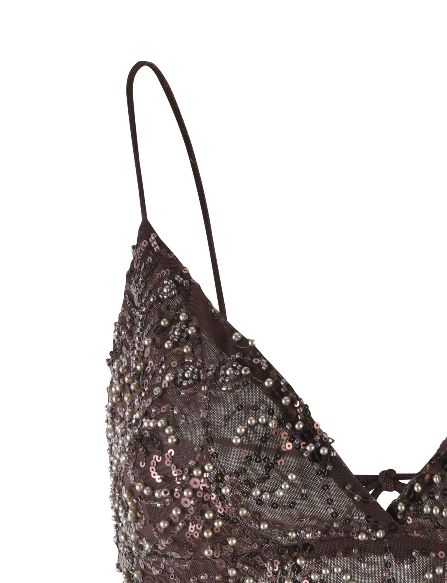 A close-up of the RAINA TOP - BROWN : CHOCOLATE from TIGERMIST, displaying its dark brown spaghetti straps adorned with intricate bead and sequin embellishments. The detailed beadwork forms a textured pattern, giving the top an elegant and sophisticated look.