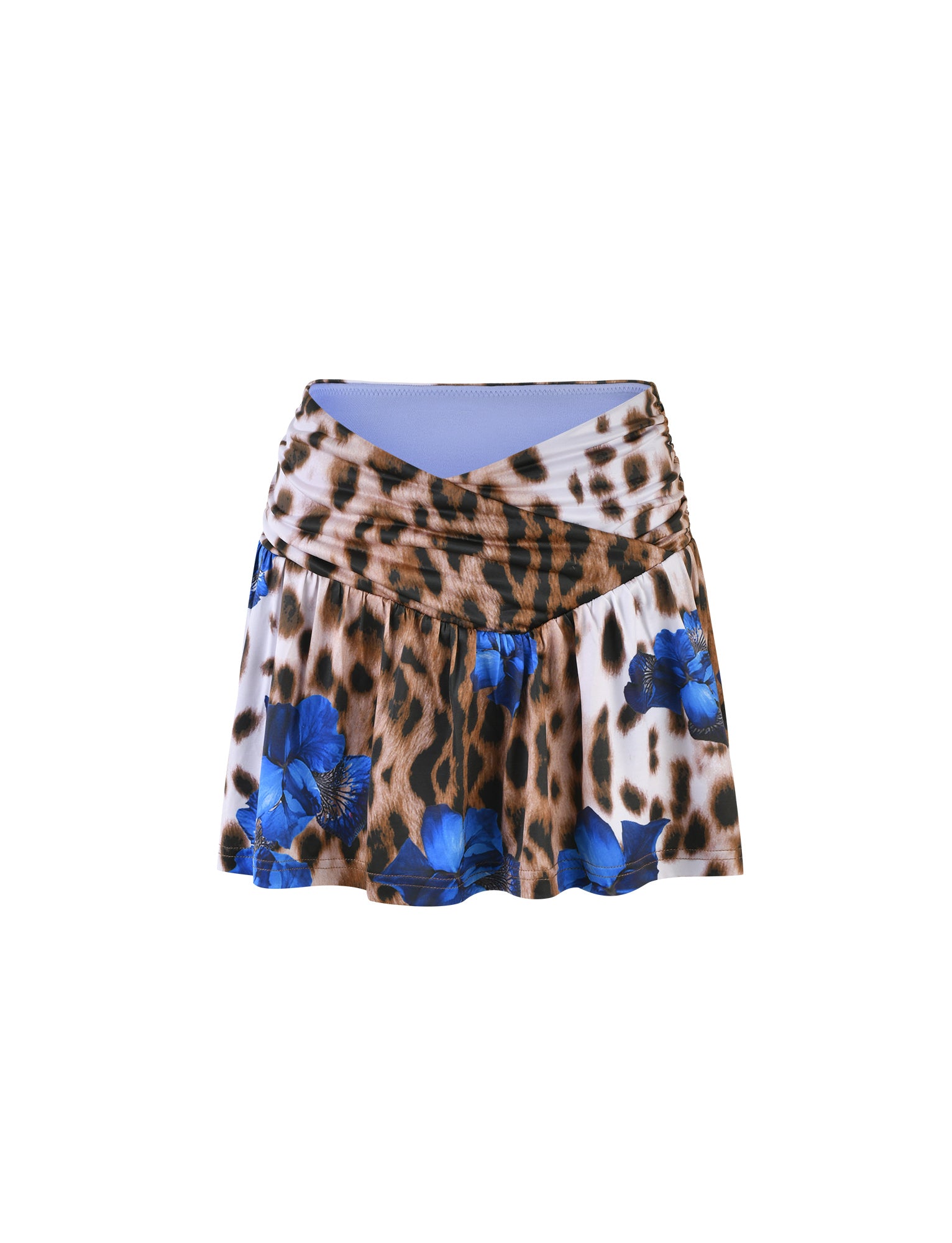 The BRIXLEY SKORT - MULTI : LEOPARD from TIGERMIST features a unique combination of leopard print and blue floral patterns. It has a belted waist, draped details at the hips, and a slightly flared hem, making it the perfect piece against a plain white background.