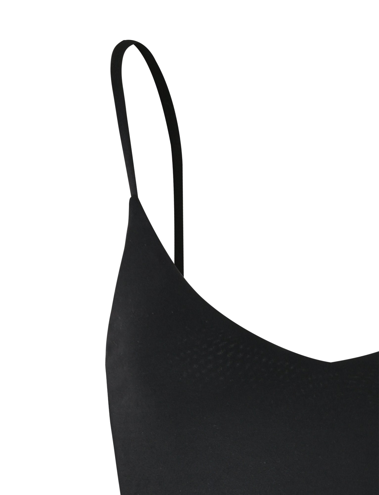 Close-up of the ALONDRA BODYSUIT - BLACK from TIGERMIST, featuring its thin spaghetti strap and part of the bodice. The smooth, fitted fabric is displayed against a white background.