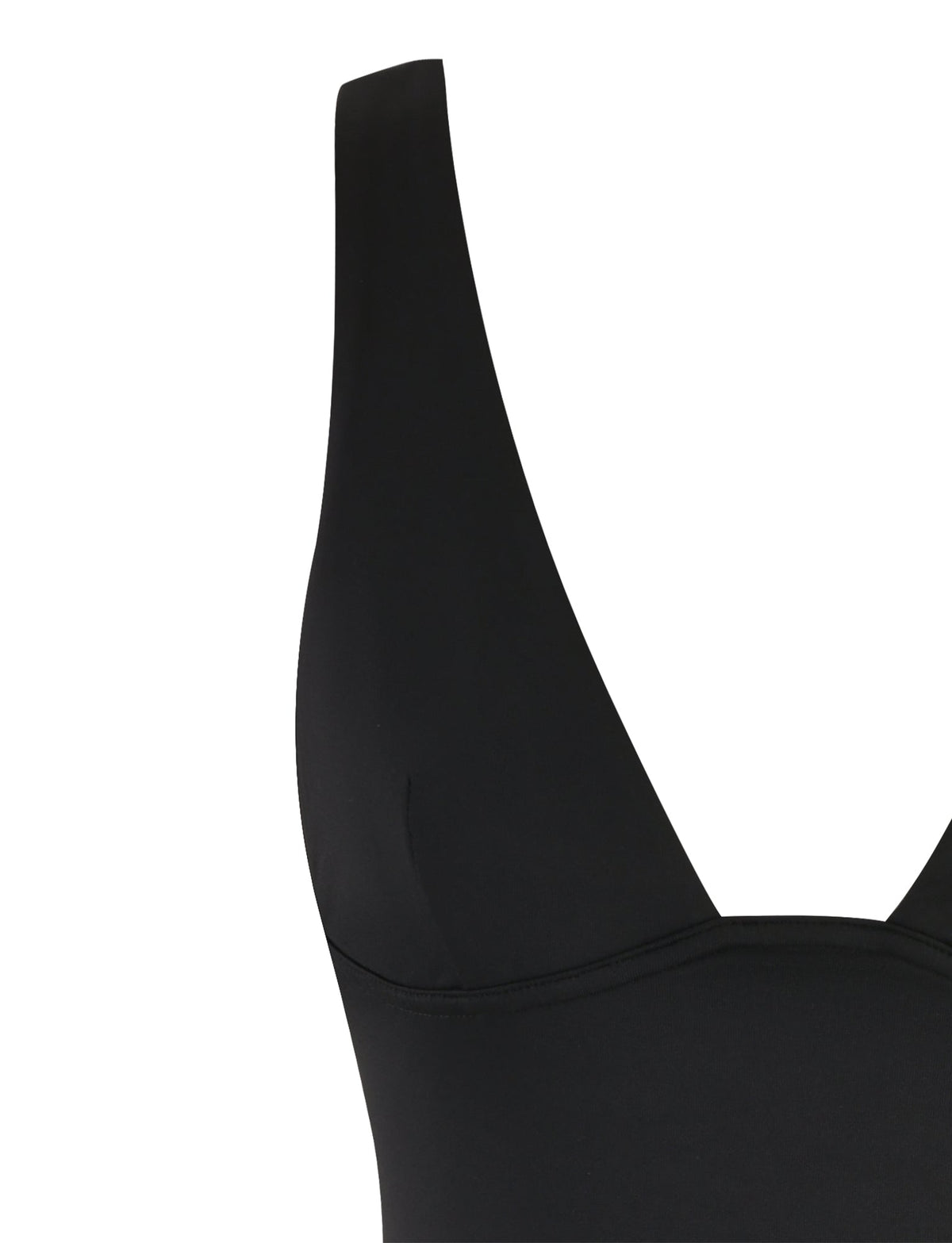The image showcases a close-up of the LUNARIA MINI DRESS - BLACK from TIGERMIST. The focus is on the upper portion, highlighting the seam and smooth fabric. The dress features a deep V neckline and is designed with a fitted style.