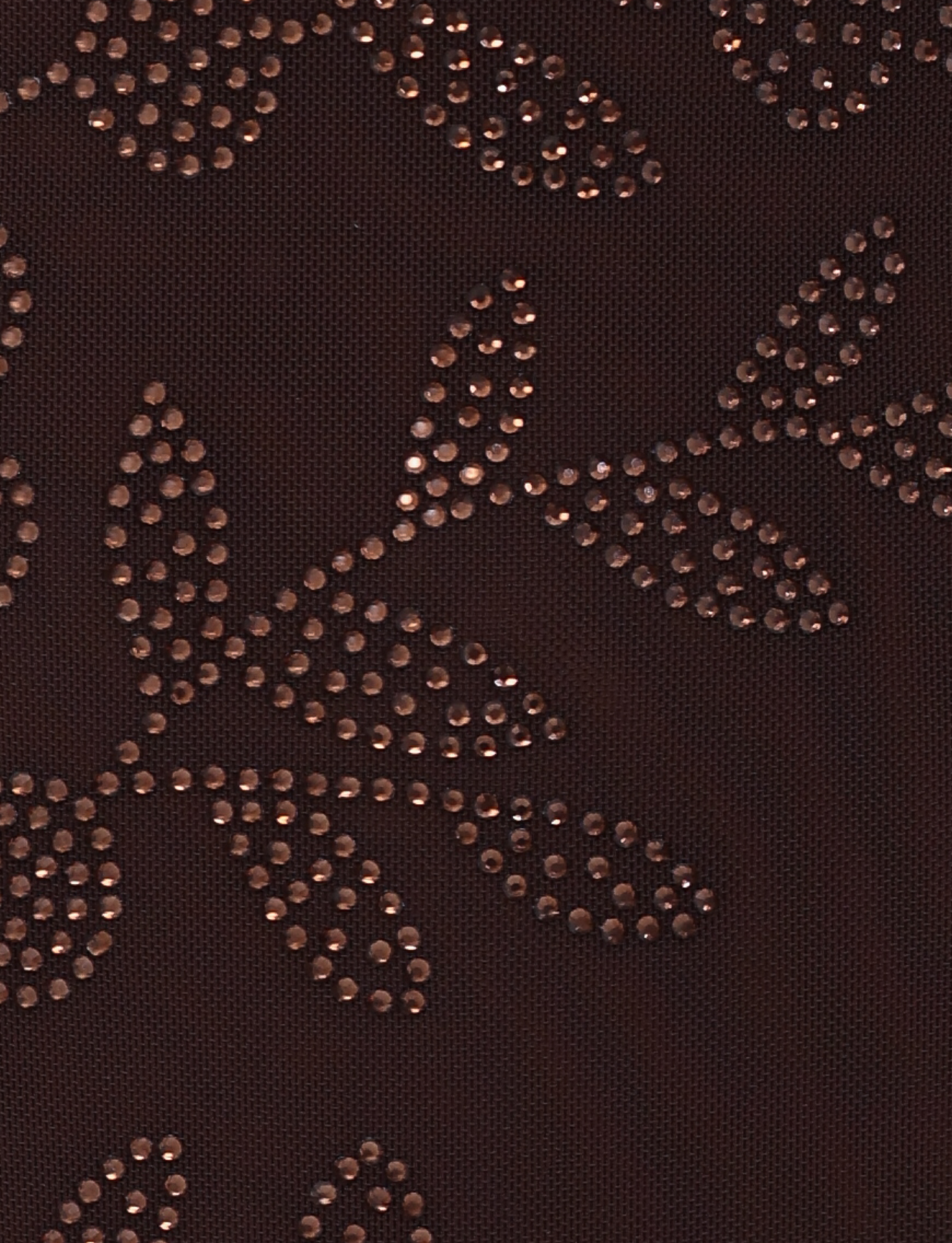 Close-up of the OCTAVIA MINI DRESS - BROWN : CHOCOLATE by TIGERMIST, featuring chocolate brown fabric adorned with shiny metallic dots forming leaf and branch shapes for a subtle and textured decorative effect.