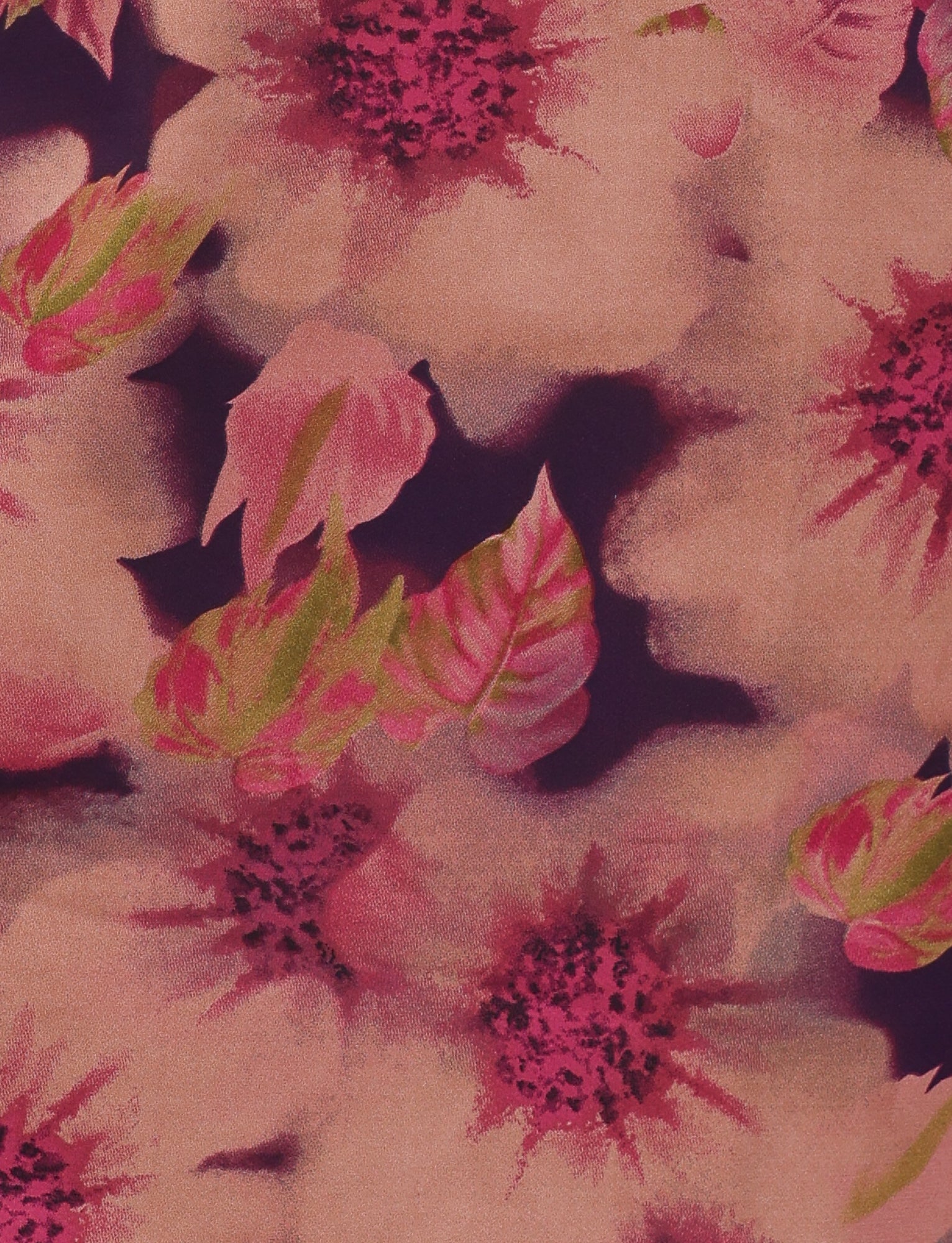 A detailed view of the floral watercolor print showcases pink and magenta flowers alongside green leaves on a blurred background. This pattern reflects the soft, abstract style found in TIGERMIST’s Monroe Dress - Purple: Floral, evoking an elegant feel similar to that of a halter neckline.