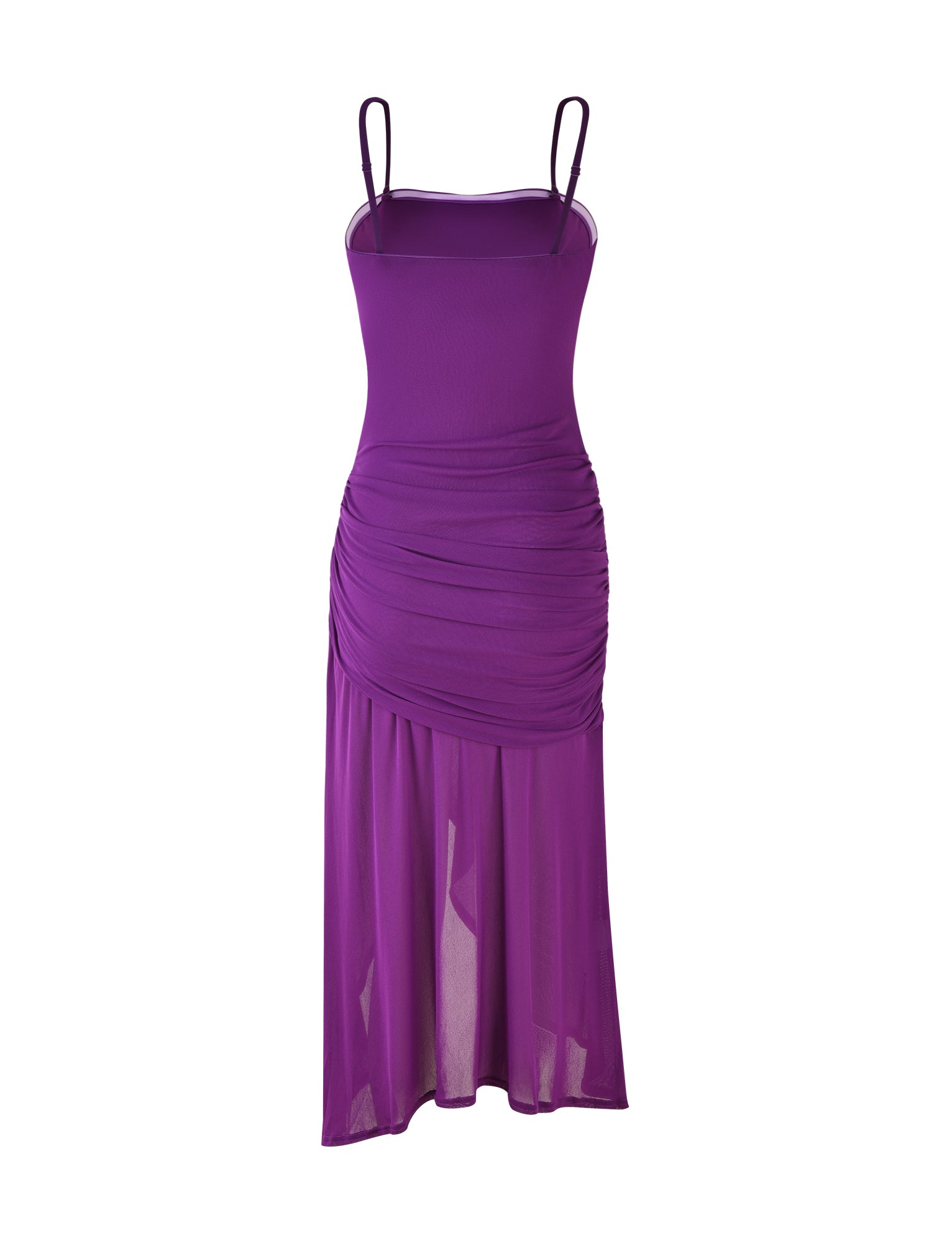 The COVE DRESS - PURPLE from TIGERMIST is a sleeveless dress with thin straps, fitted at the top. It features a ruched design around the waist and a sheer overlay that extends to an asymmetrical hem, creating a layered look.