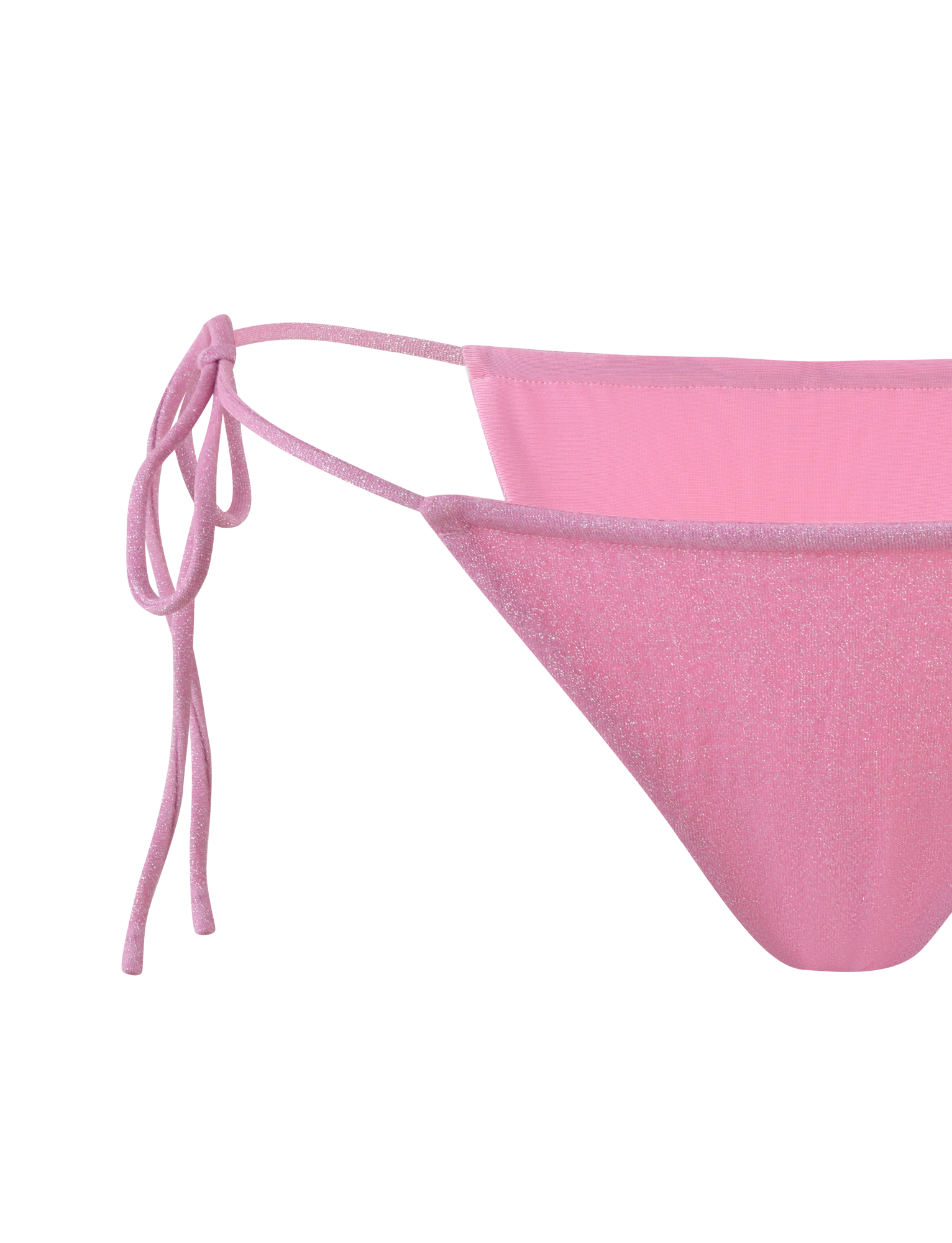 A close-up of the TIGERMIST ELLISON BIKINI BOTTOM in Baby Pink, featuring adjustable side ties and a subtle shimmery texture, set against a plain pink background.