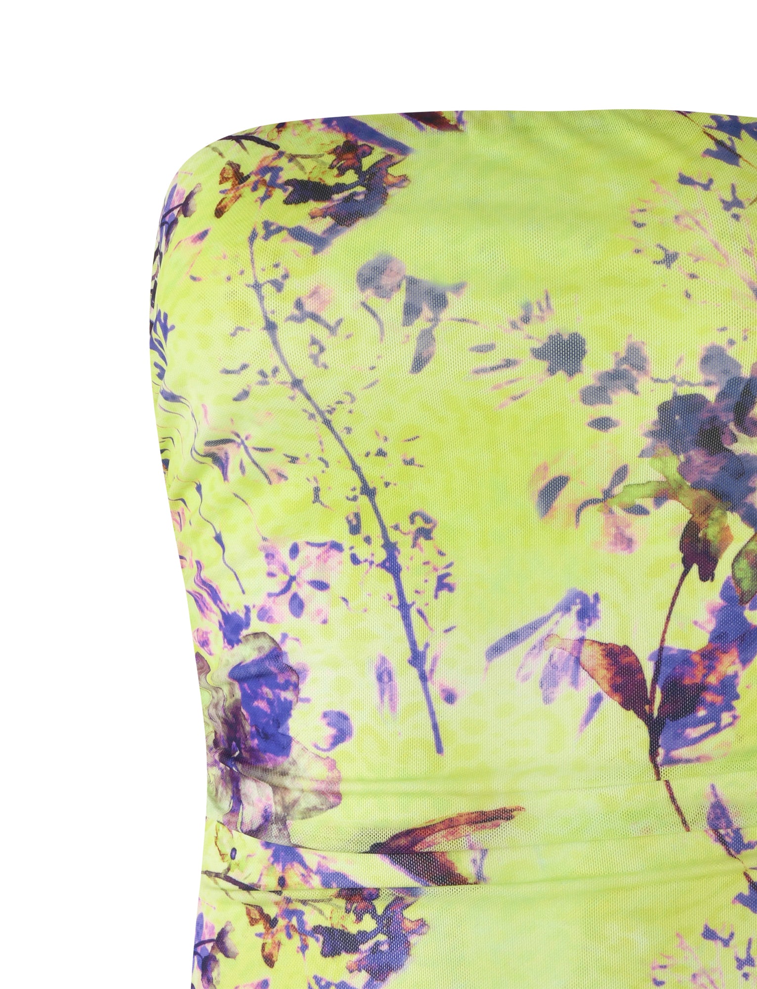 A close-up of the KELLAN TOP - GREEN by TIGERMIST against a bright yellow background, showcasing a vibrant and summery floral pattern with abstract motifs in shades of purple, pink, and green.