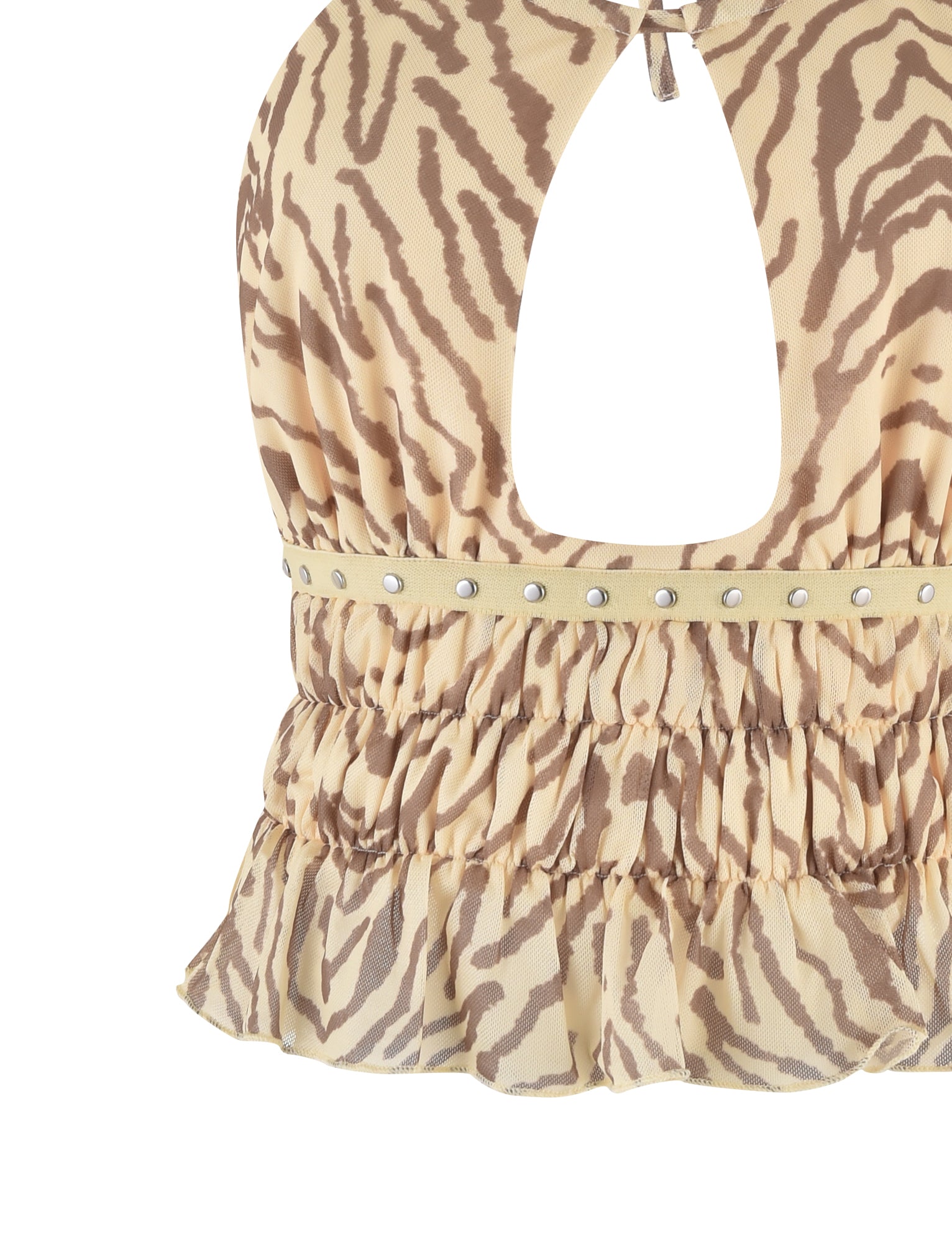 A close-up of the RUMER TOP - YELLOW : ZEBRA by TIGERMIST, showcasing its beige and yellow zebra-print design, halter neck, open back with a tie closure, adjustable bust panels, gathered and ruched bodice with silver-studded detailing along the waist, and ruffled hem.