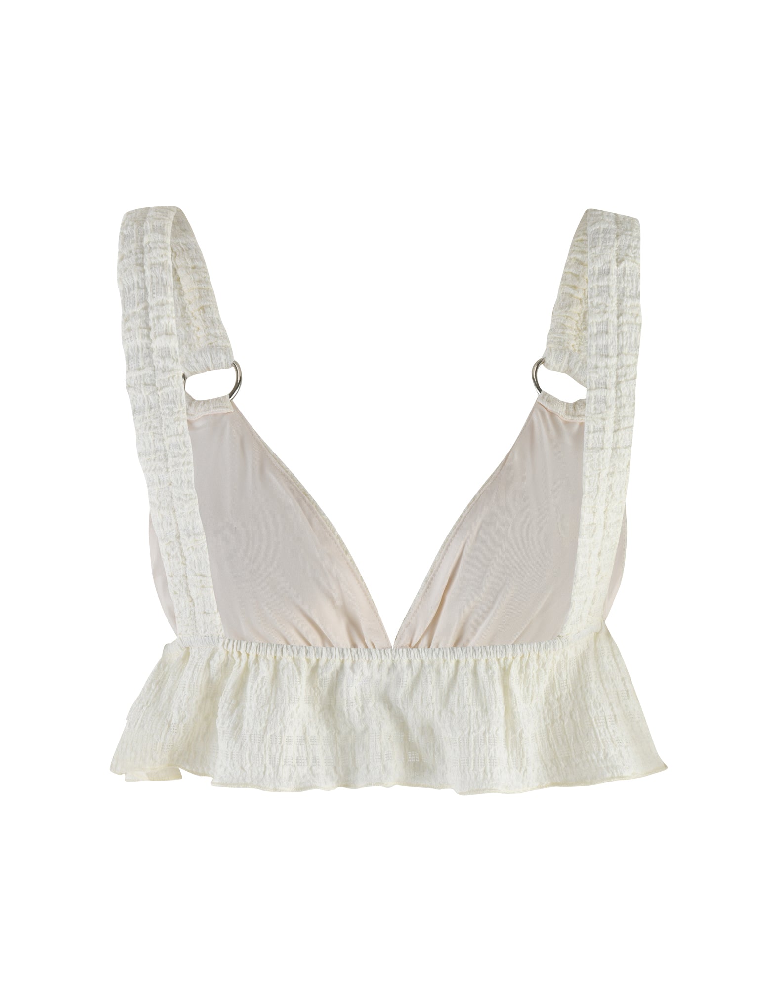 A close-up of the ALDRIDGE TOP - WHITE by TIGERMIST showcases its cream-colored bralette design featuring wide, textured straps and an elastic, ruffled band at the bottom. The lightweight, breathable fabric adds to its simple yet elegant style, reminiscent of a white camisole top with subtle details that enhance its feminine appeal.