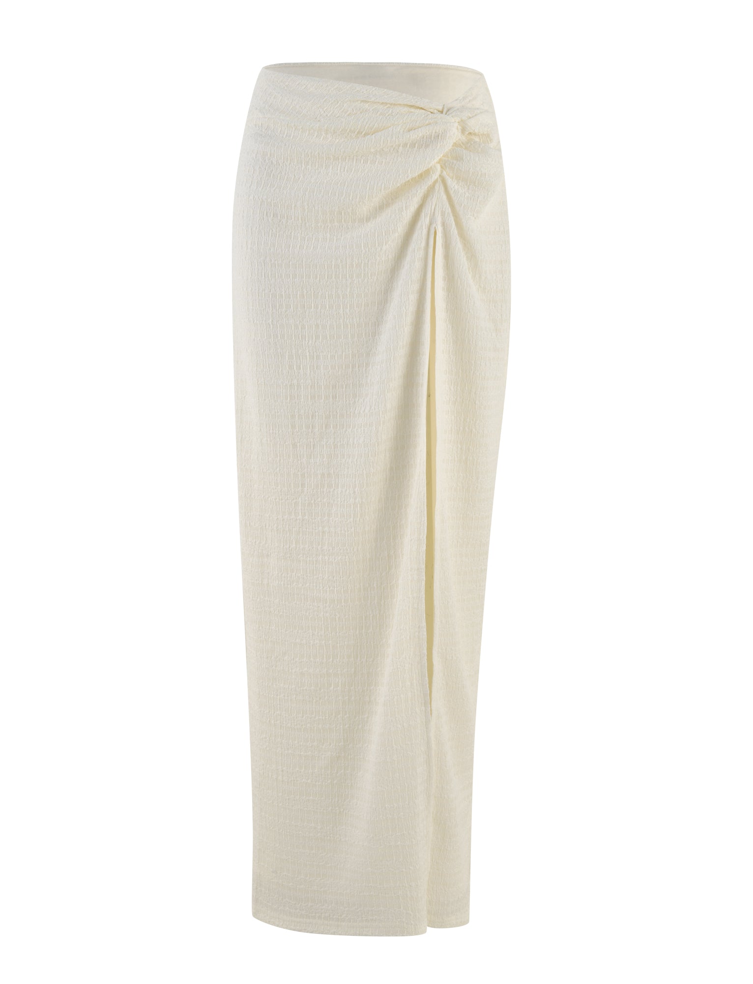 The ALDRIDGE SKIRT - WHITE by TIGERMIST is a long skirt in a textured fabric. It features a high waist and has a draped design with a twist knot detail at the side. The relaxed silhouette, crafted from textured jersey, flows elegantly down to the ankles for an effortlessly chic look.