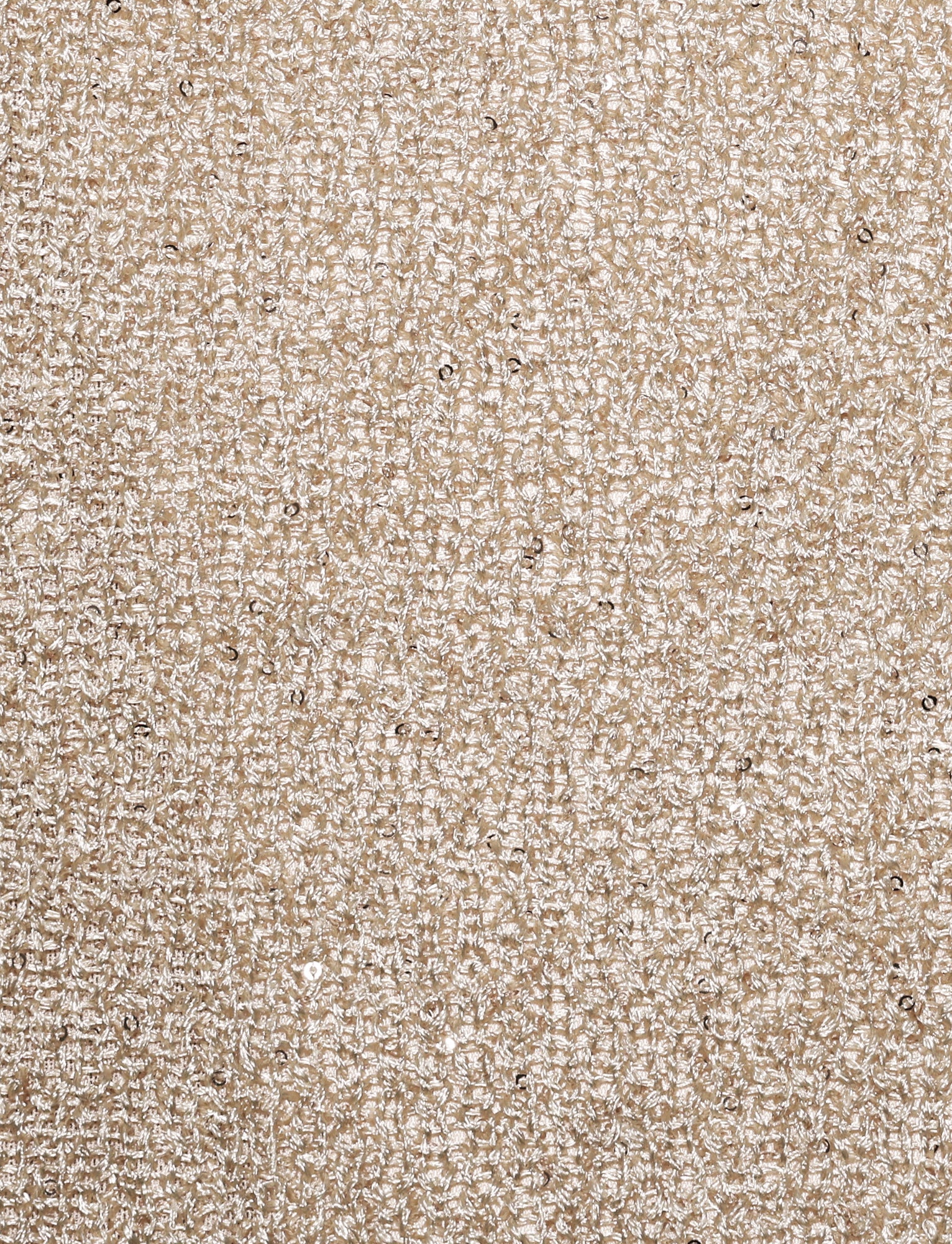 Close-up of the CONNELL TOP - GOLD by TIGERMIST, showcasing a textured beige fabric with intricate stitching and small metallic elements dispersed throughout, creating a sparkly effect. The pattern appears uniform and repetitive, providing an elegant and luxurious feel, enhanced by subtle sequin details.