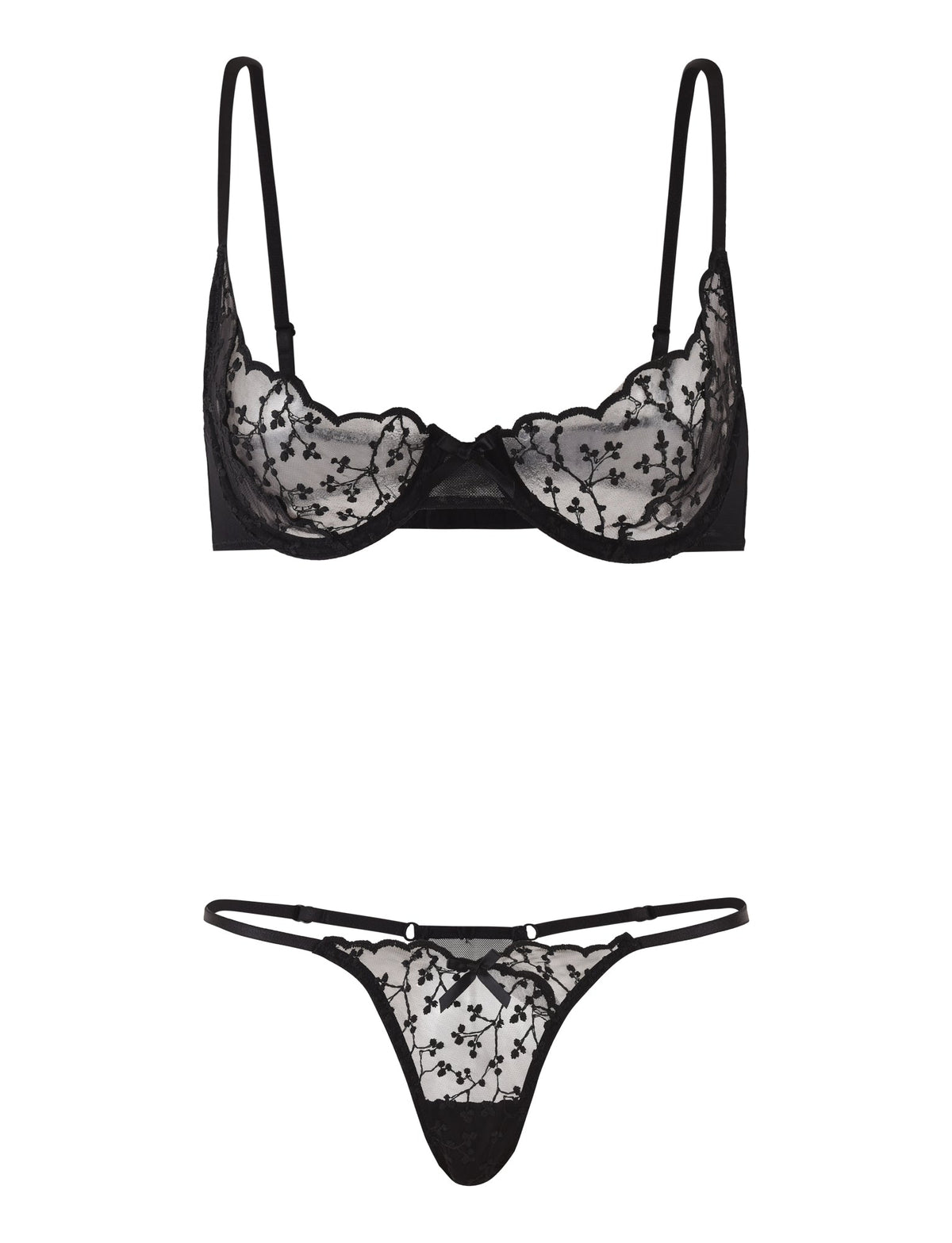 The TALIYAH SET - BLACK by TIGERMIST features an underwire bra with floral lace detailing and adjustable straps, paired with a matching low-rise g-string adorned with the same lace floral pattern. The set is showcased against a plain white background.