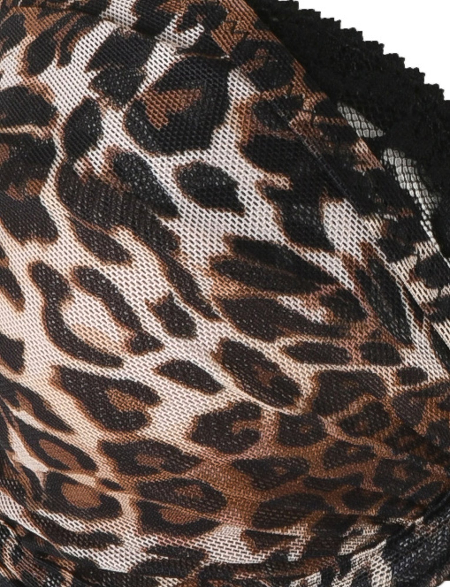 Close-up of the ALANIS SET - NEUTRAL : LEOPARD by TIGERMIST, featuring a leopard print fabric with black lace detailing at the edge. This bra and g-string set boasts dark brown and black spots on a light brown background, complemented by adjustable shoulder straps for a perfect fit.