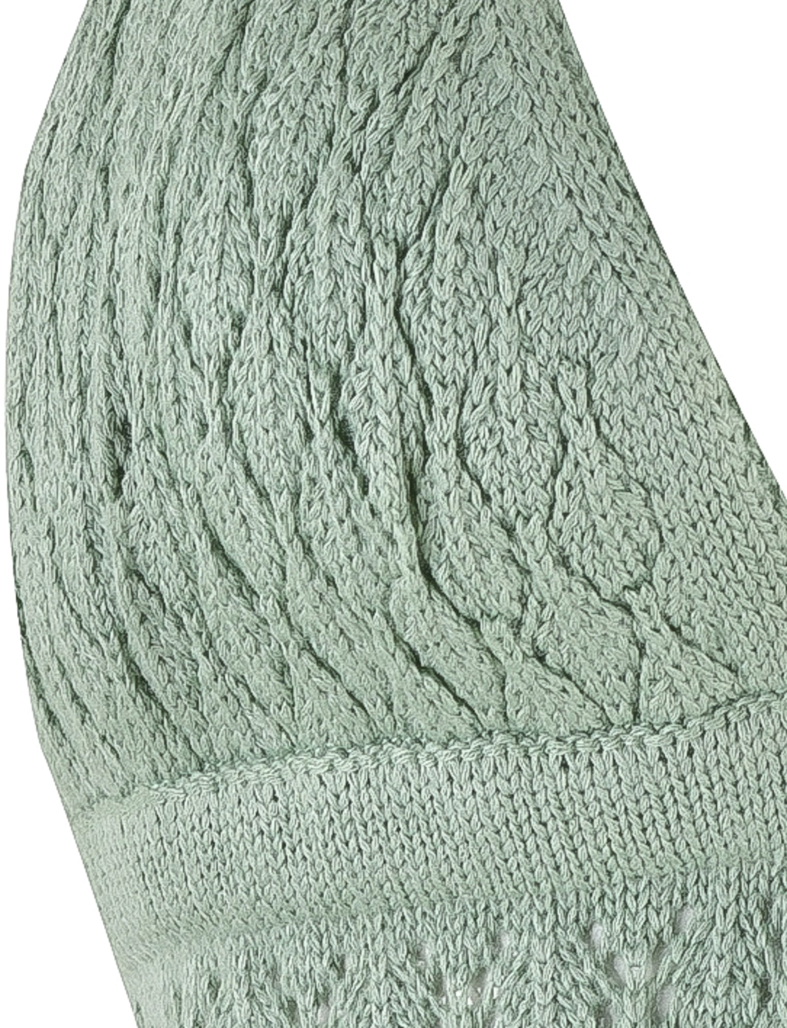 Close-up of the TIGERMIST COLLINA TOP - GREEN, showcasing its decorative, textured pattern with interwoven stitches. The image highlights intricate detailing and a soft, cozy appearance with high-stretch fabric, focusing on the top section of the garment.