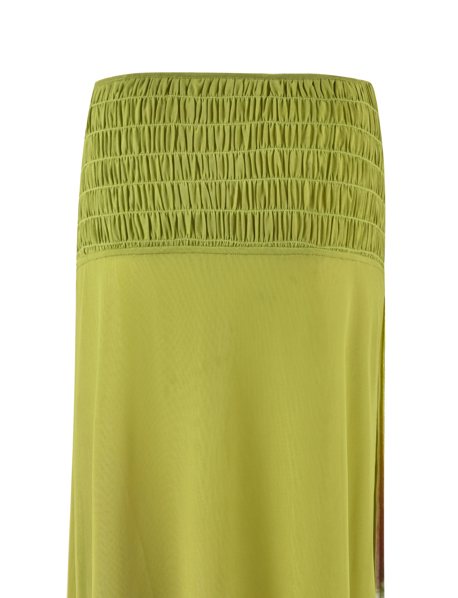 A close-up of the WAVERLY SKIRT in green with a vertically smocked waistband and a side slit. The fabric appears lightweight and flowy. The image captures the upper portion of the skirt, focusing on the stitching and texture of the waistband, emphasizing its sophisticated low-rise waist design by TIGERMIST.
