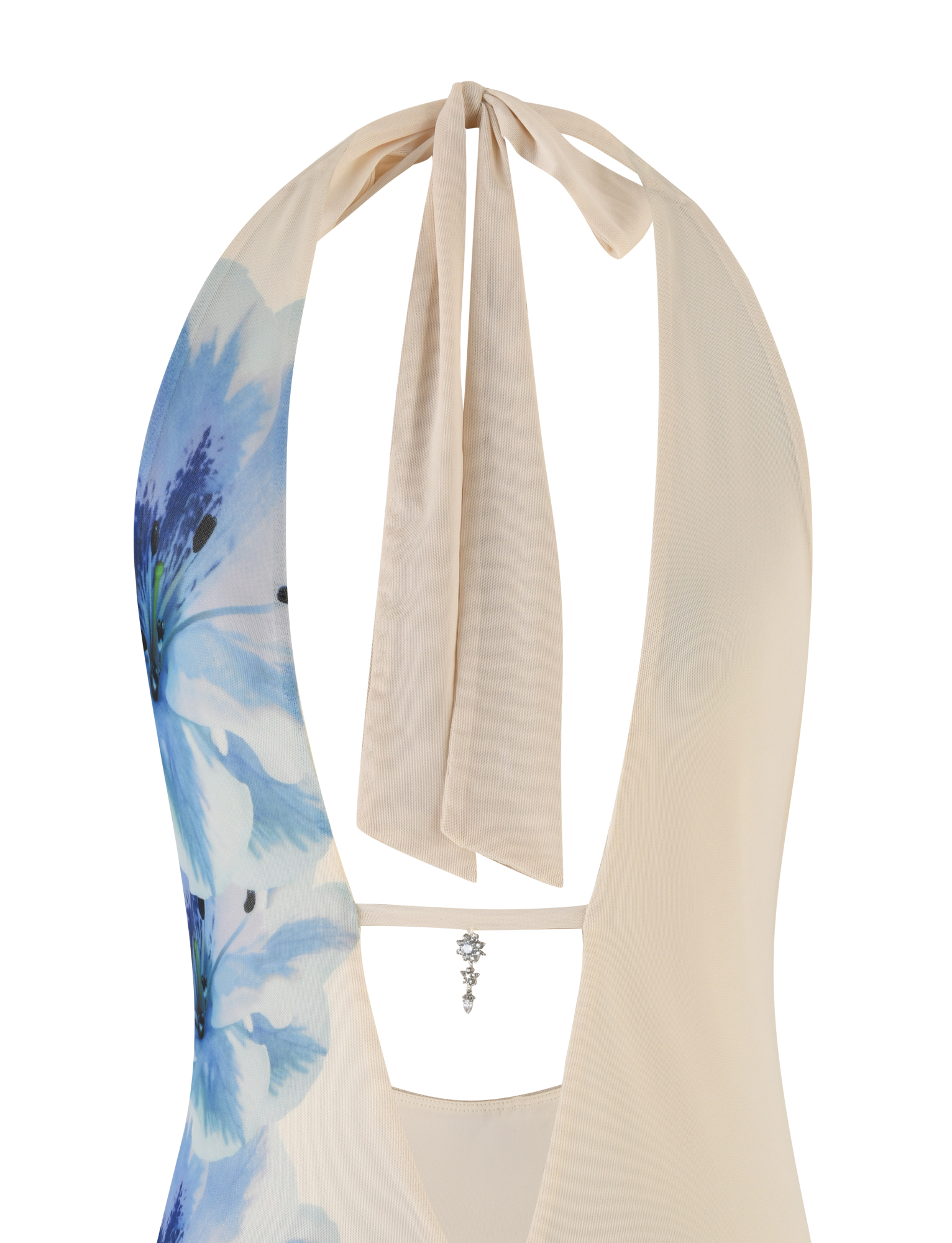 The TIGERMIST BROOKS DRESS in white/cream features a floral print, halter-neck with tie straps, low back, and a small decorative charm at the lower back.