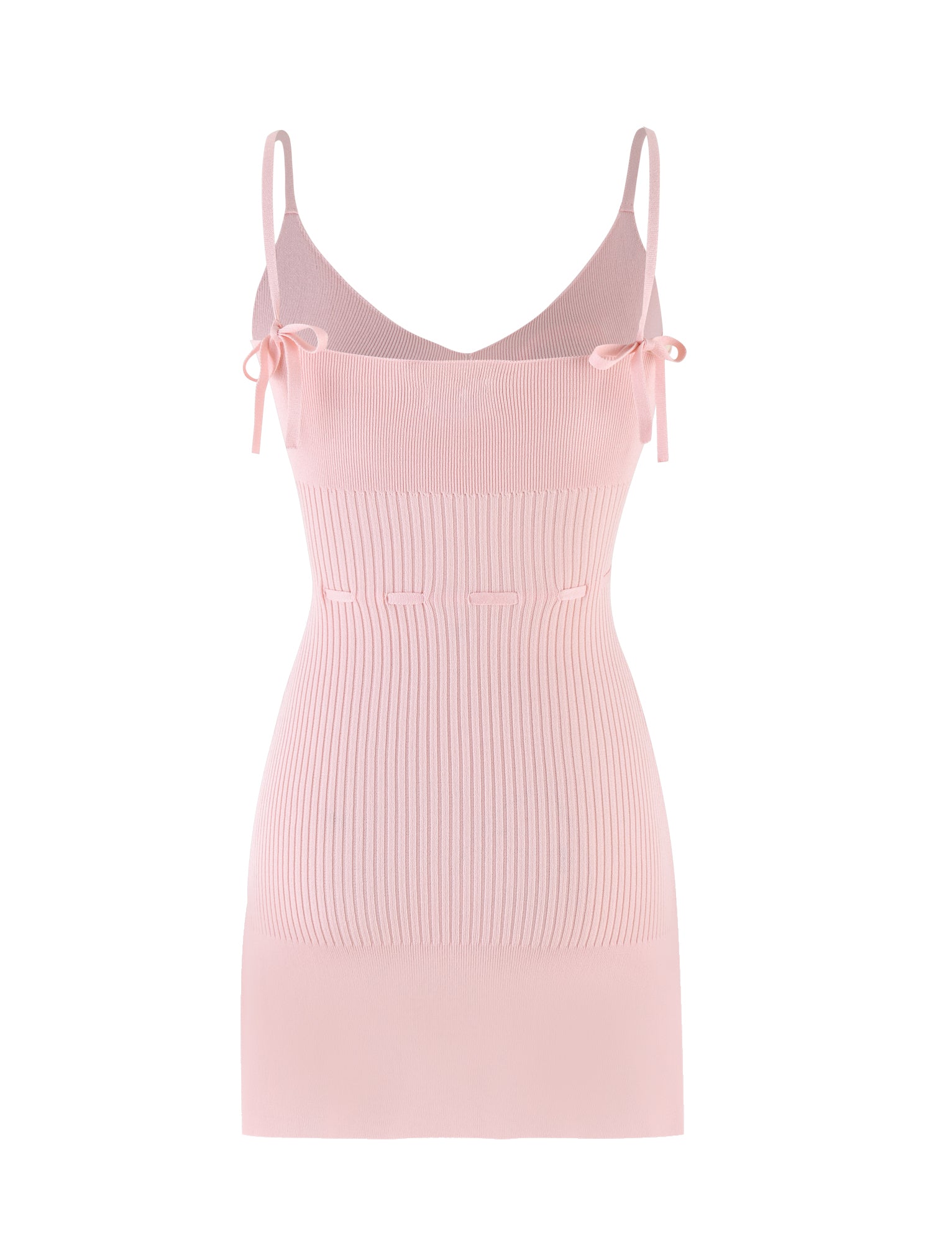 The GREER DRESS - PINK from TIGERMIST is a sleeveless baby pink bodycon slip dress featuring true-tie shoulder straps and small ribbon details. It uses knit fabrication with a ribbed texture around the waist for a fitted appearance.