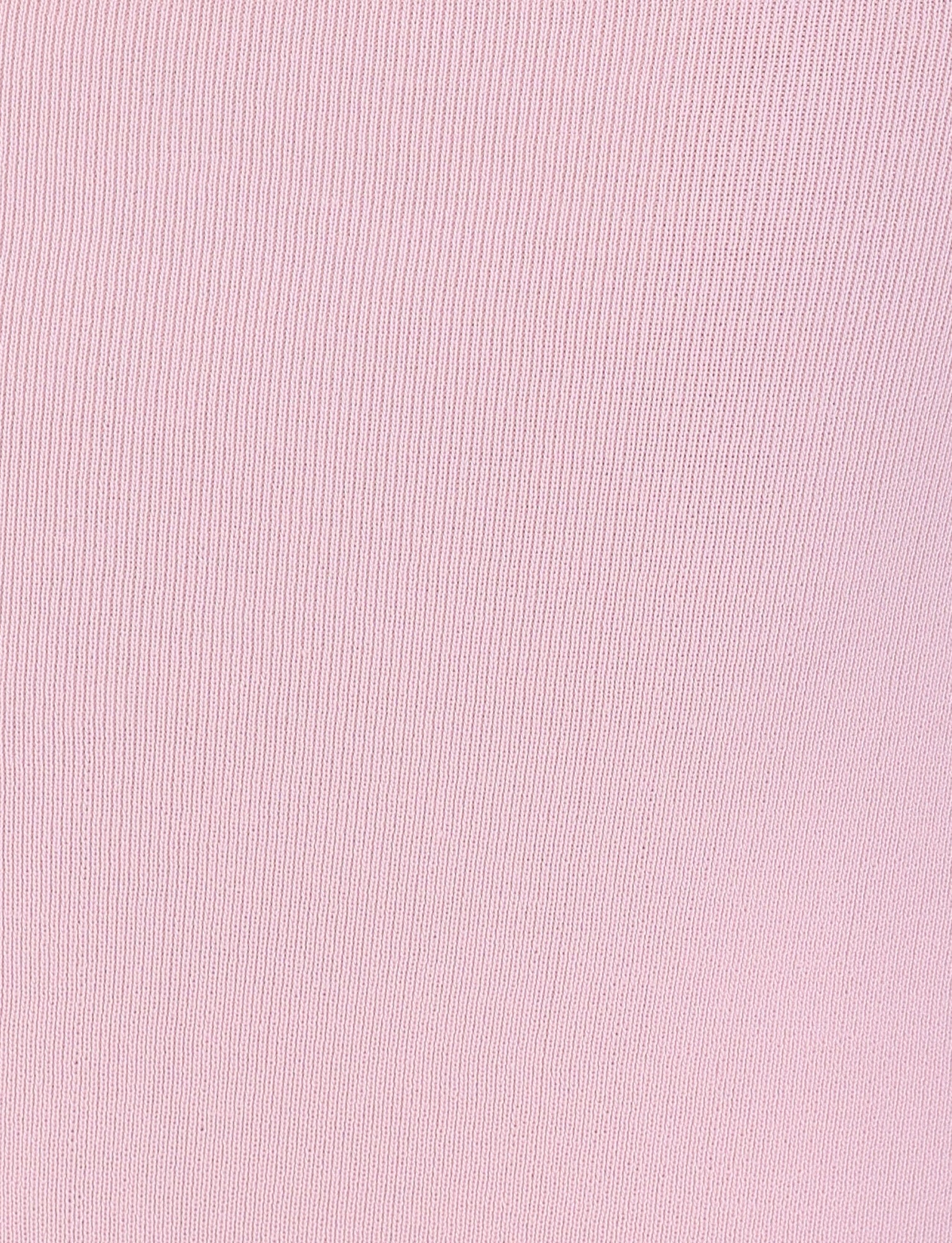 Close-up of the fabric texture of the LILYANA SKIRT in baby pink by TIGERMIST, perfect for a relaxed fit midi skirt. It features fine vertical lines and a soft, subtle pattern. The material appears smooth and uniform, accentuating the delicate intricacies of the weave.