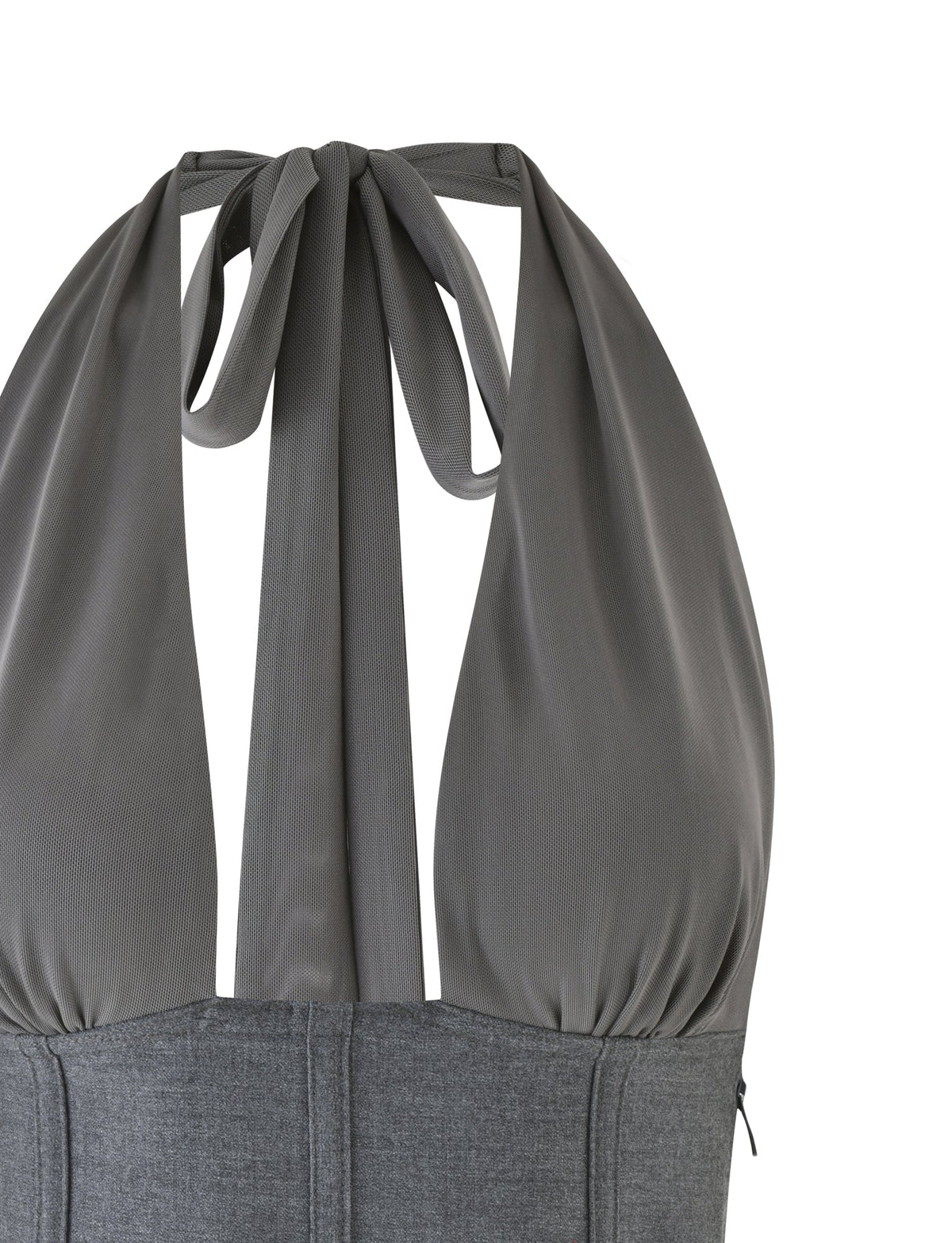 Presenting the JANECE TOP - GREY by TIGERMIST: A chic sleeveless halter top crafted from grey suiting material. It boasts a gathered upper section for a soft drape, a fashionable tied back, a plunging neckline, and is finished with a convenient zipper closure.
