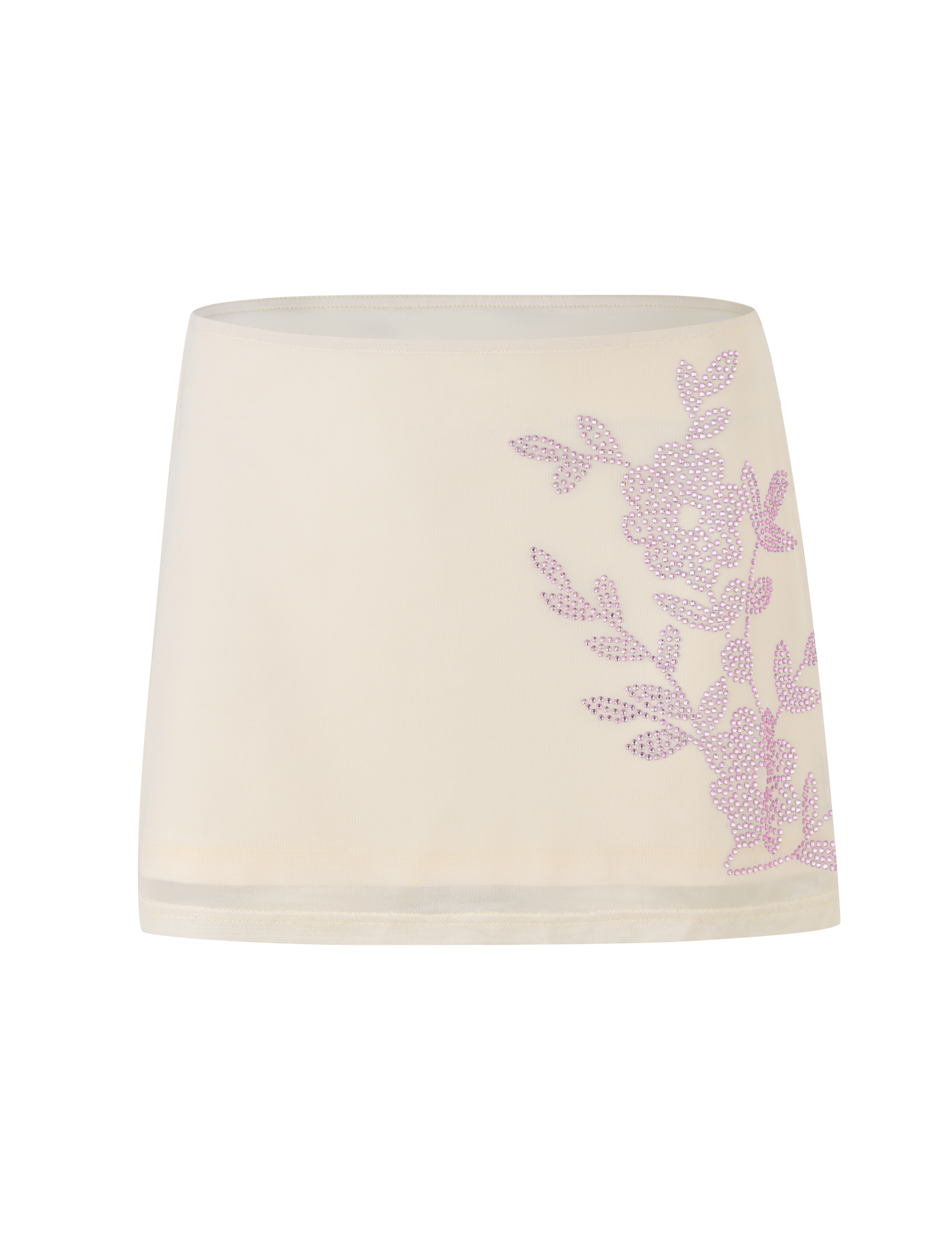 The OCTAVIA MINI SKIRT - NEUTRAL : CREAM by TIGERMIST is a cream mini skirt with a light purple rhinestone floral design on one side.