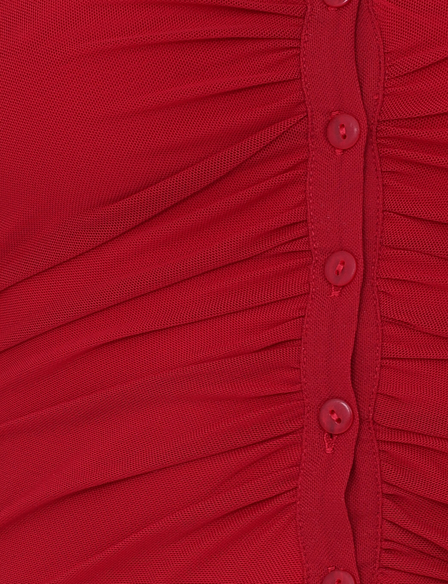 Close-up of the TIGERMIST ZAFIRA TOP in red, a halter neck style with gathered mesh fabric and a vertical row of red buttons. The textured, ruched material creates a flattering bodycon fit.