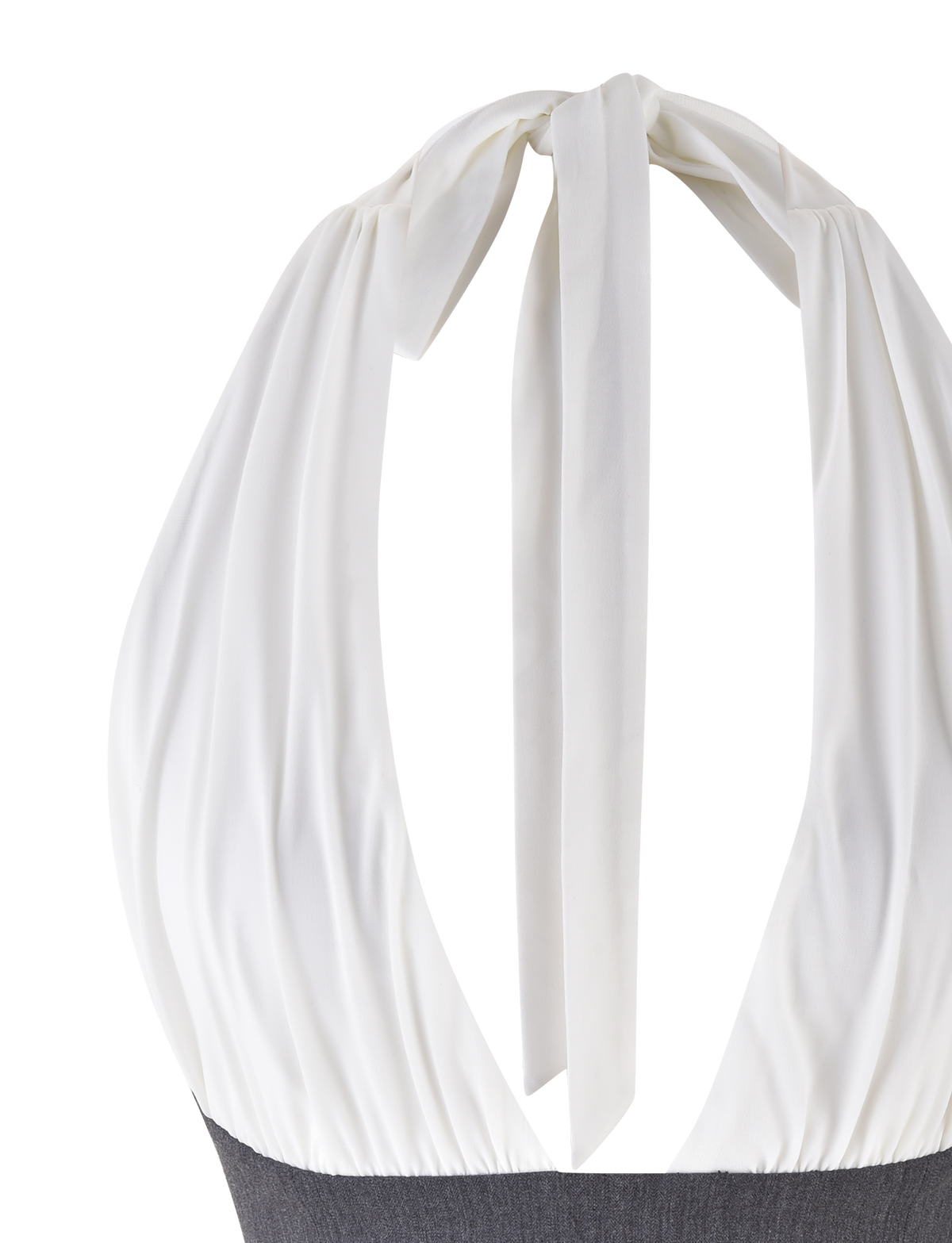 A close-up of the TIGERMIST LOTUS TOP - CREAM : GREY, featuring a large bow at the neck with draped fabric down the back, paired with a dark gray bottom.