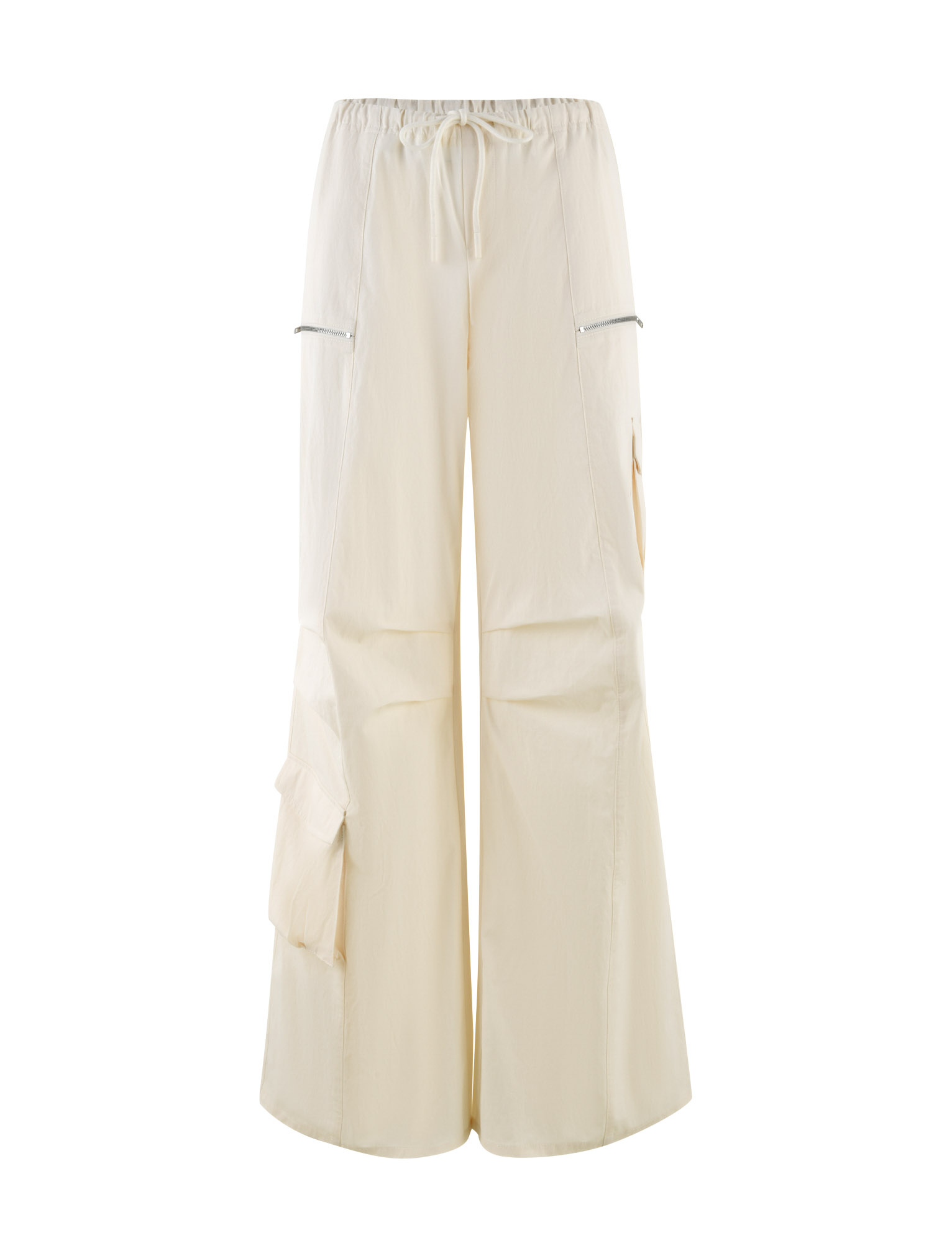 The TIGERMIST HERMIONE PANT in Soft Butter features a wide-leg, baggy cargo style with an elastic drawstring waist, zippered side pockets, and large leg flap pockets, showcased on a plain white background.