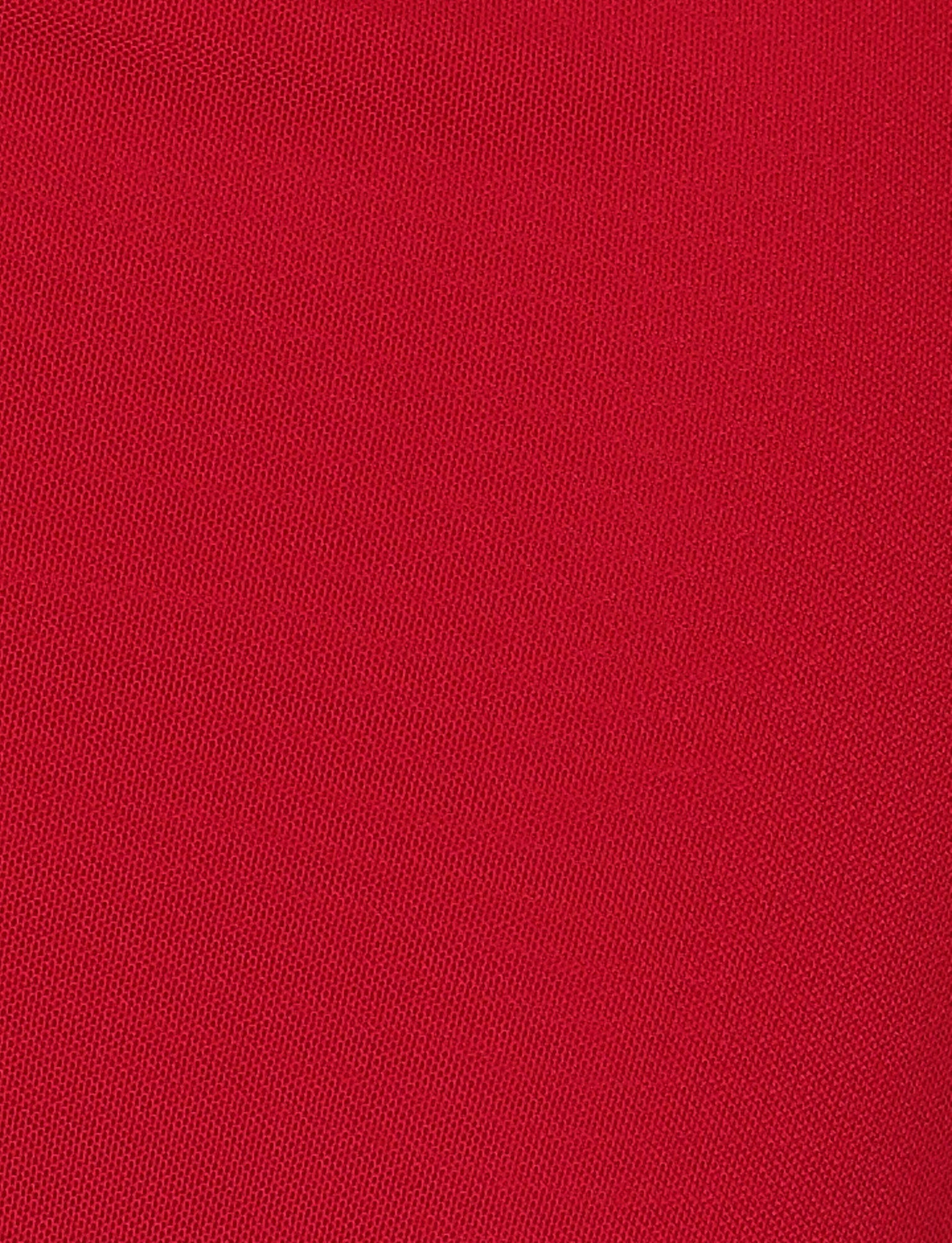 A close-up of the BRESILY MAXI DRESS - RED by TIGERMIST shows its fine, red textured fabric with a smooth, uniform weave—perfect for highlighting subtle embroidery or delicate halter straps.