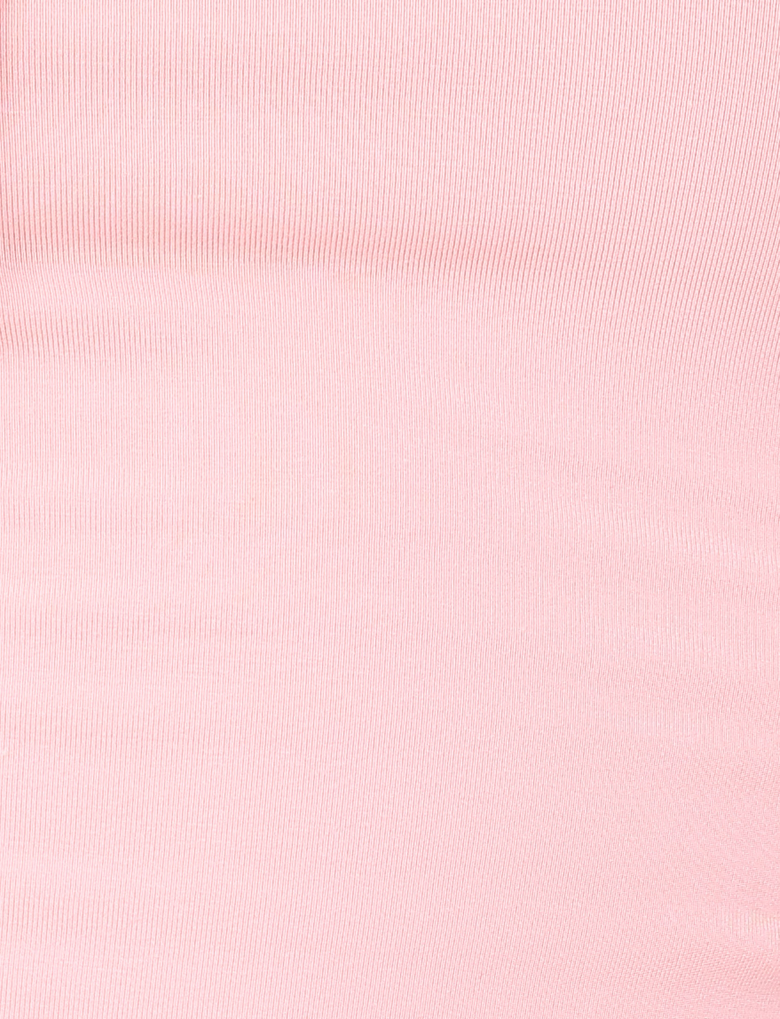 Close-up of the TIGERMIST MIRELLE TOP in pastel pink, featuring light pink ribbed fabric with subtle vertical lines and a soft, gentle texture throughout.