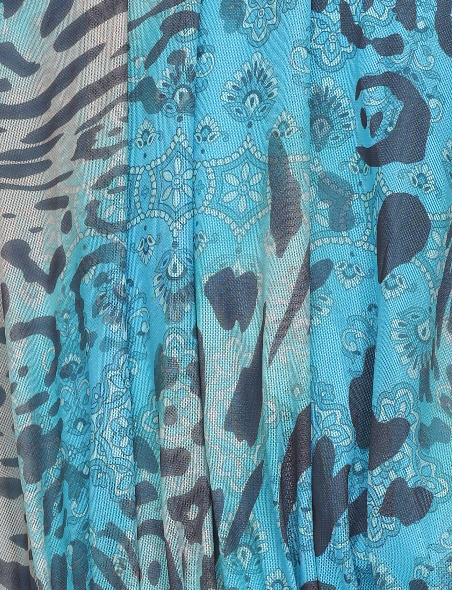 Close-up of the TIGERMIST EVANNA MINI DRESS - MULTI: LEOPARD SWIRL, featuring a vibrant mix of leopard and paisley patterns—perfect for a high-neck, bodycon mini dress with eye-catching texture.